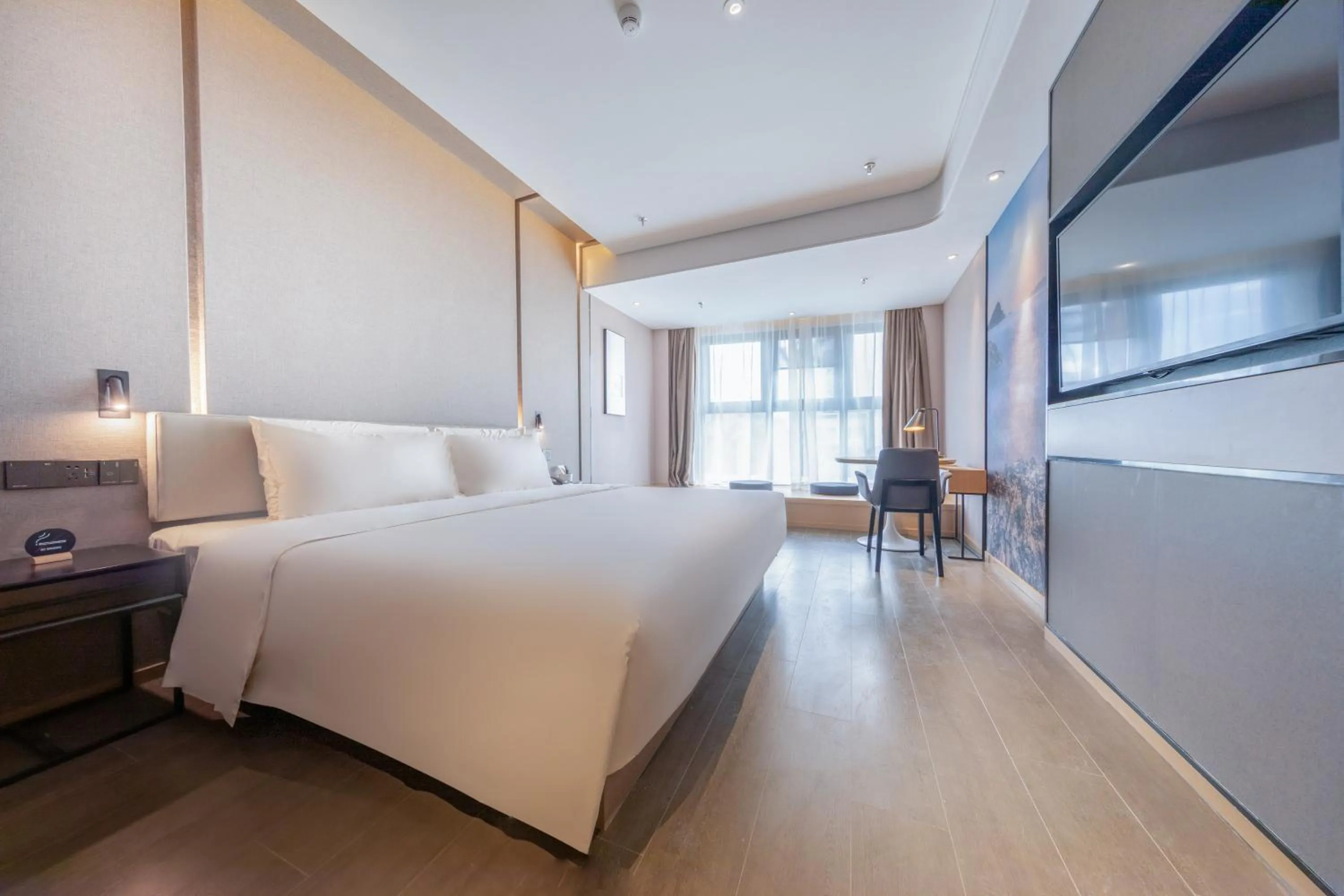 Bed in Atour Hotel Shenzhen Shajing International Convention and Exhibition Center