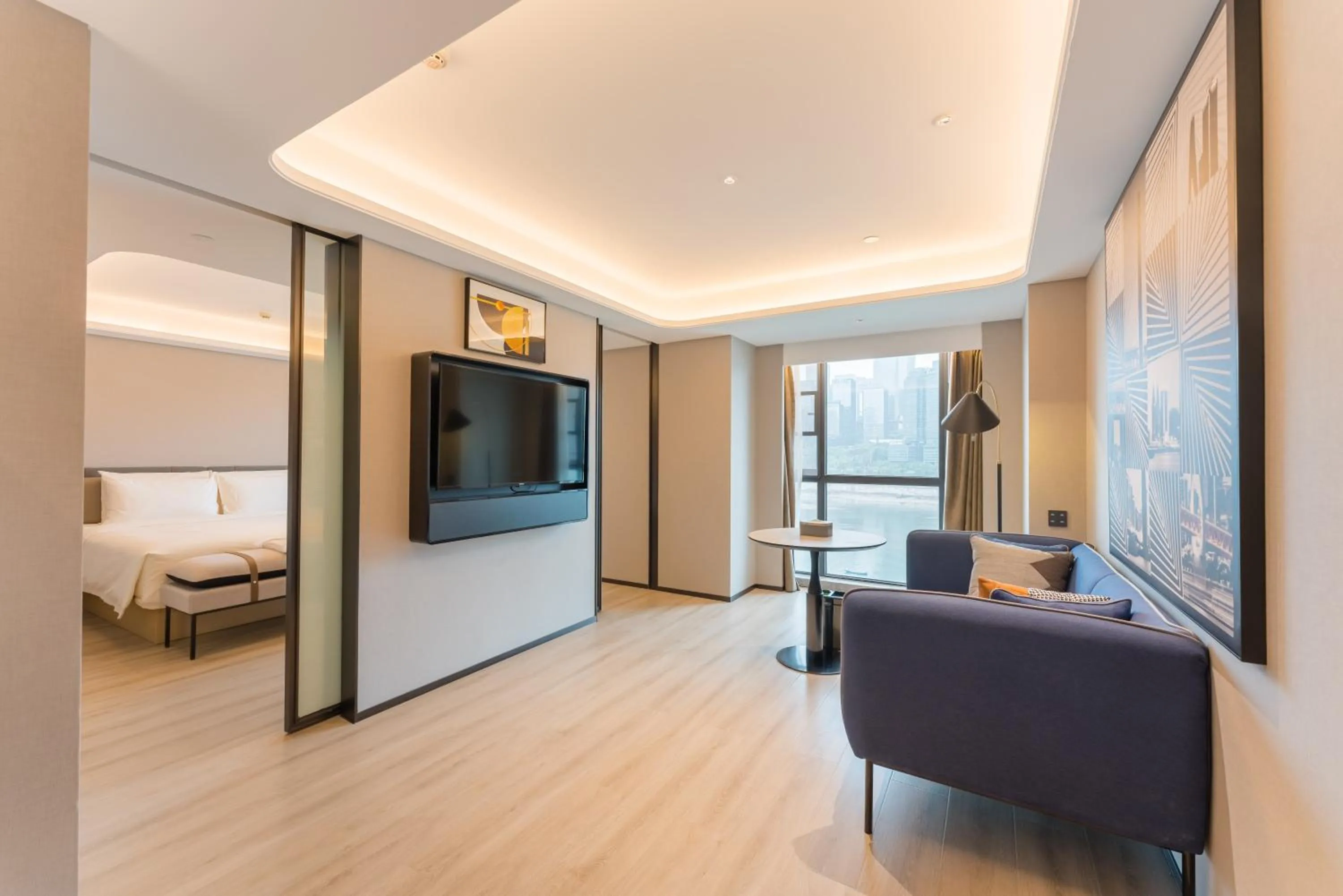 Living room, Bed in Atour S Hotel Chongqing Jiefangbei Hongyadong Riverview