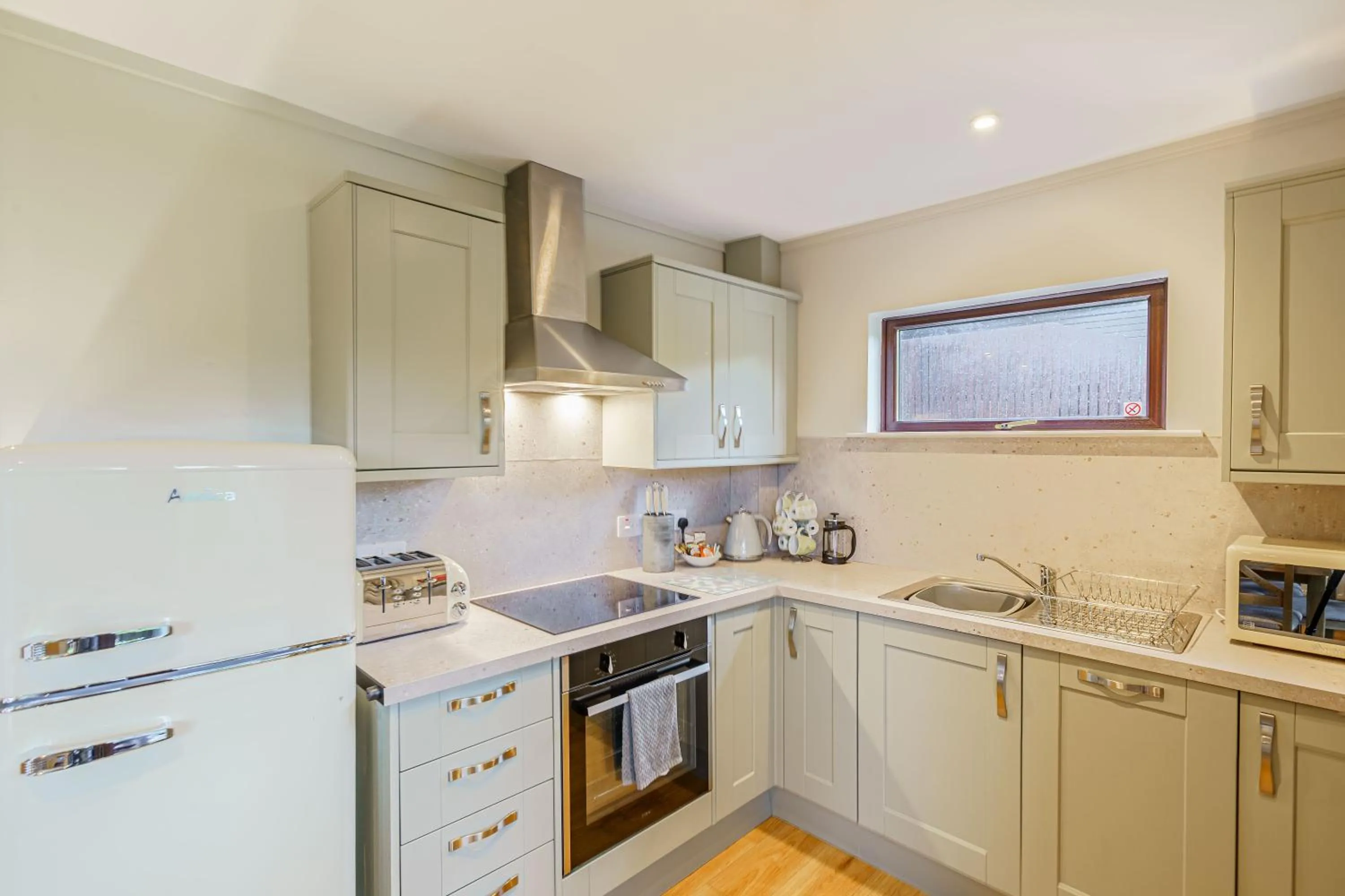 Kitchen or kitchenette in Birch Lodge 13 with Hot Tub