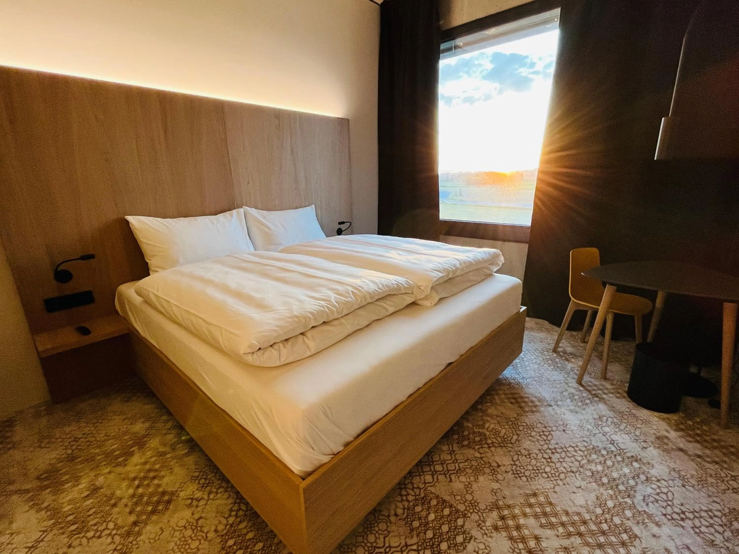 Photo of the whole room, Bed in Boulderbar Hotel Self-Check in