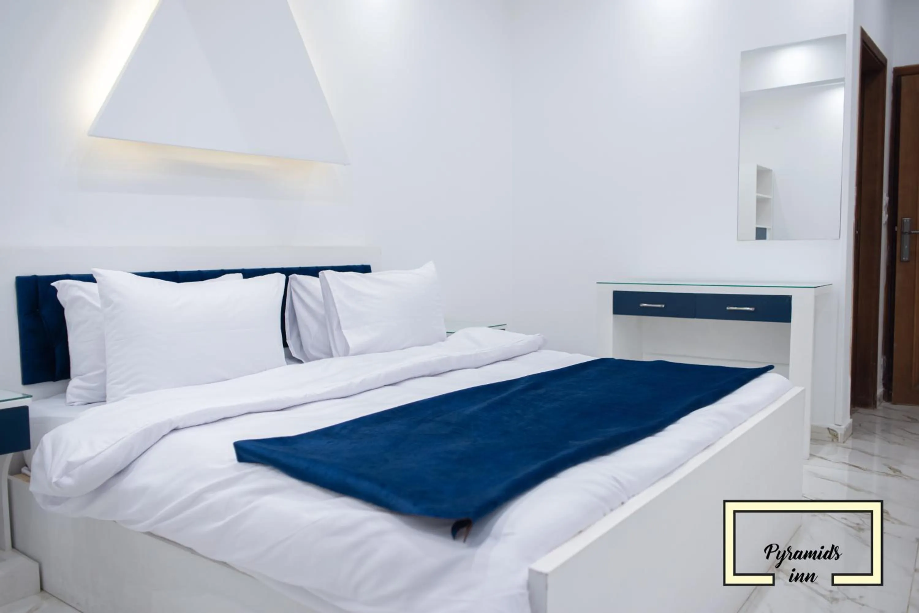 Bed in PR Pyramids Inn