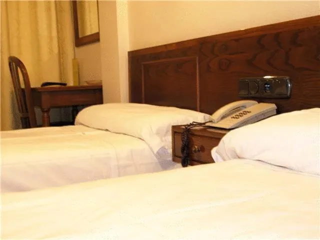 Photo of the whole room, Bed in Hotel Ibiltze