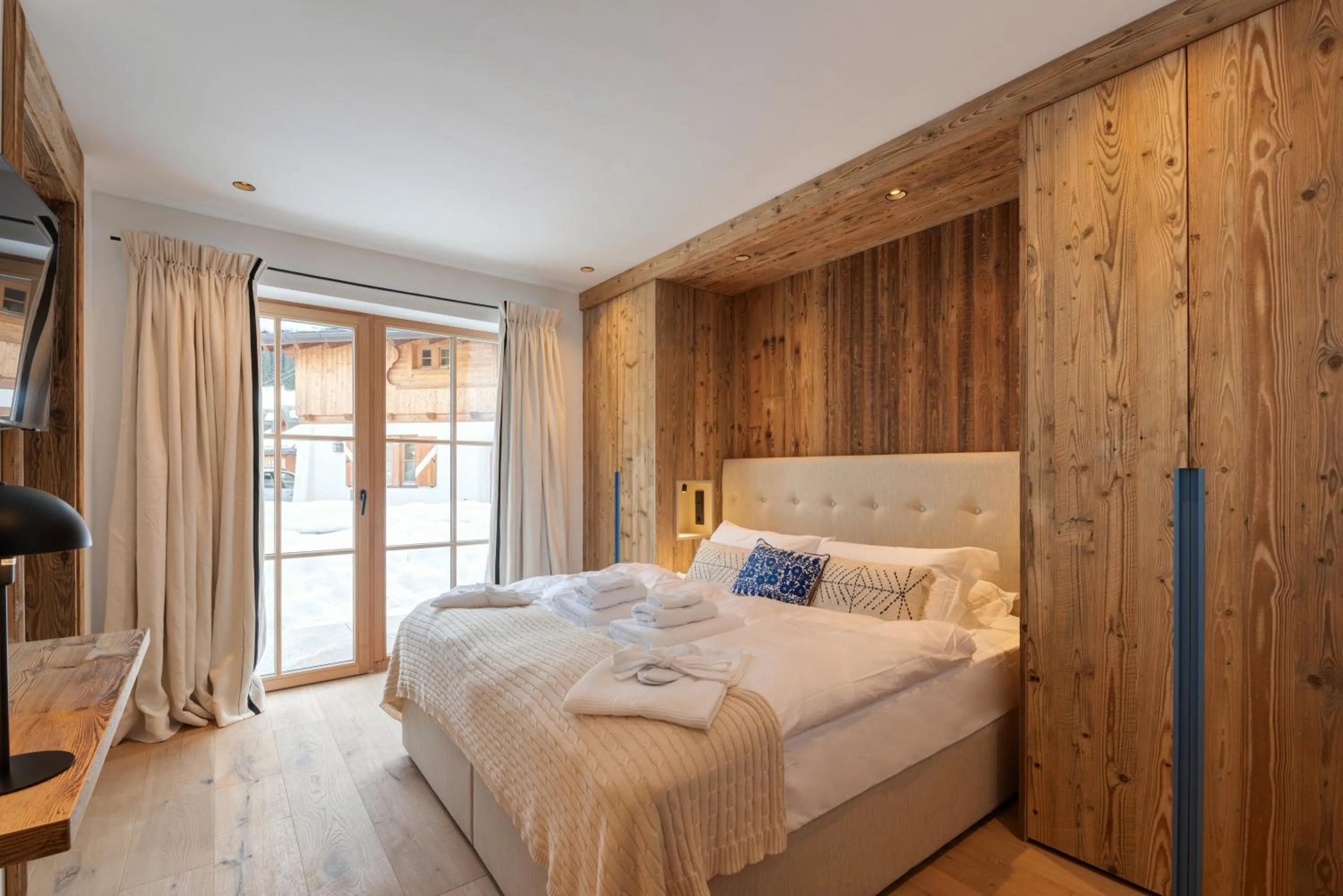 Bedroom in Chalet Marmotta CULM - Luxus Chalet Ski-In Ski-Out