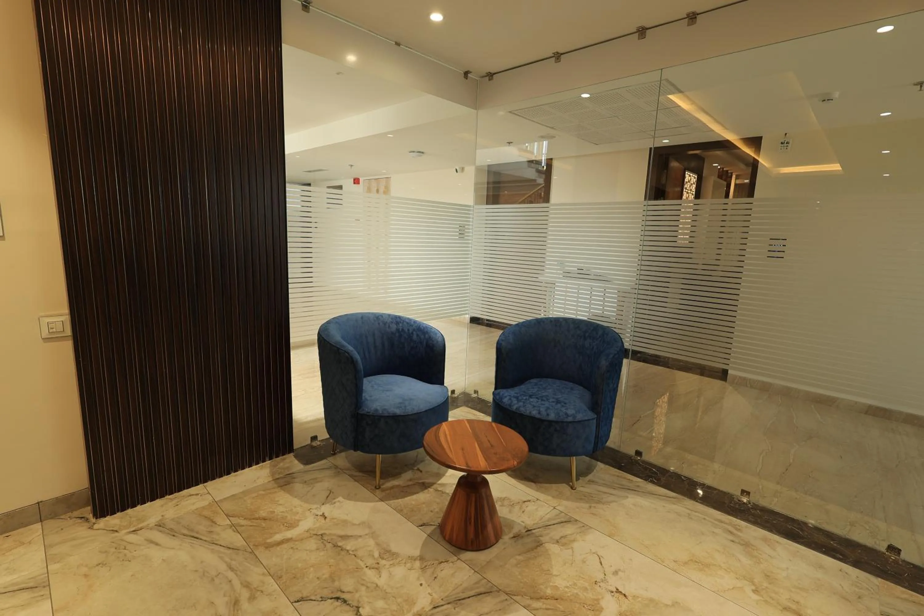 Seating area in Krishna Hotel And Resort