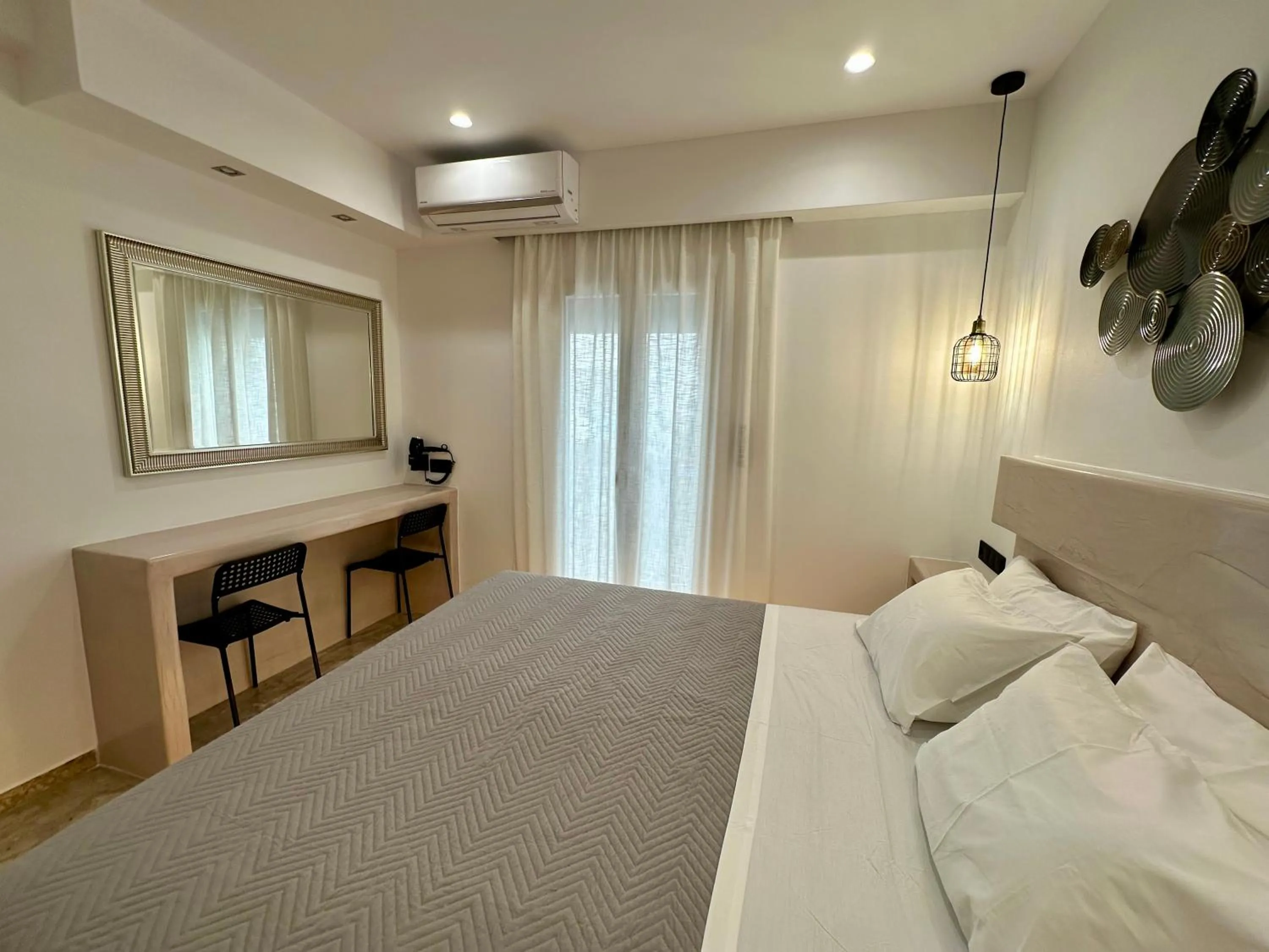 Bed in Aphrodite Hotel & Apartments