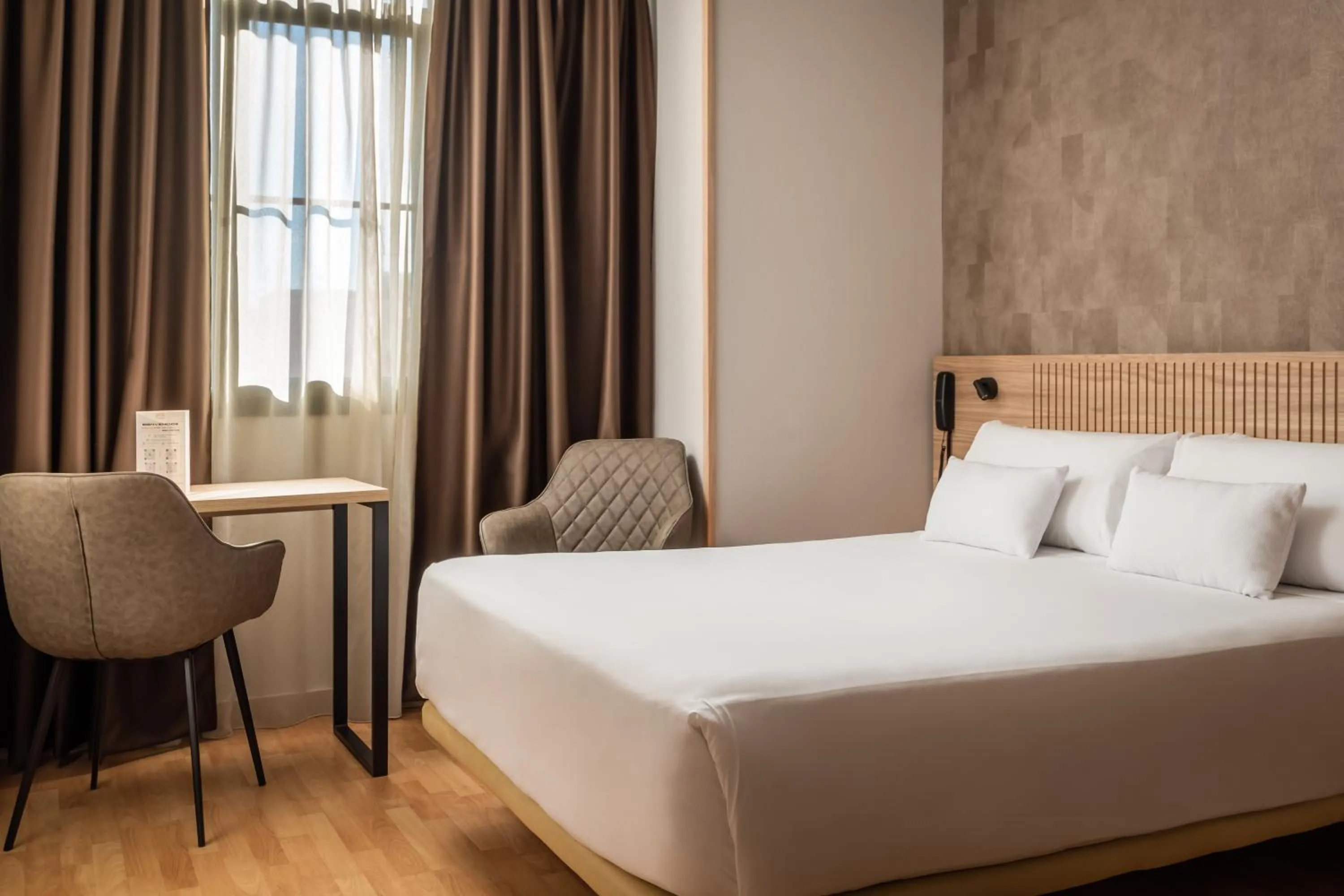 Bed in Petit Palace Eixample