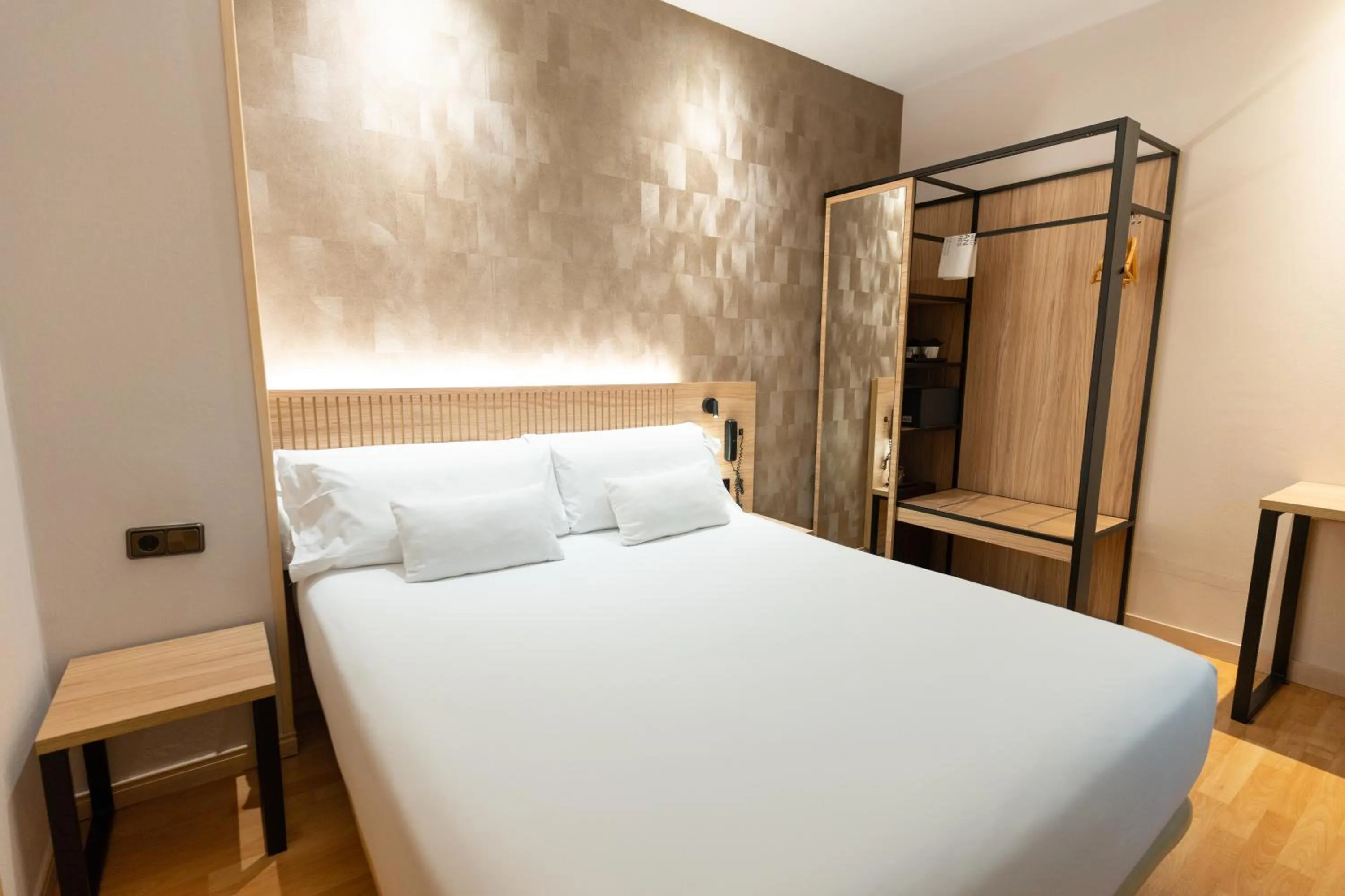 Bed in Petit Palace Eixample