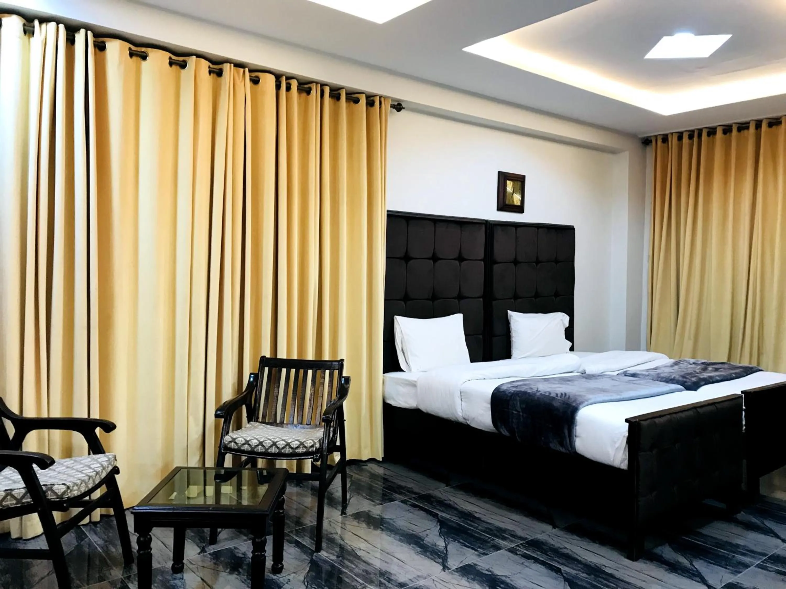 Photo of the whole room, Bed in Grand Taj