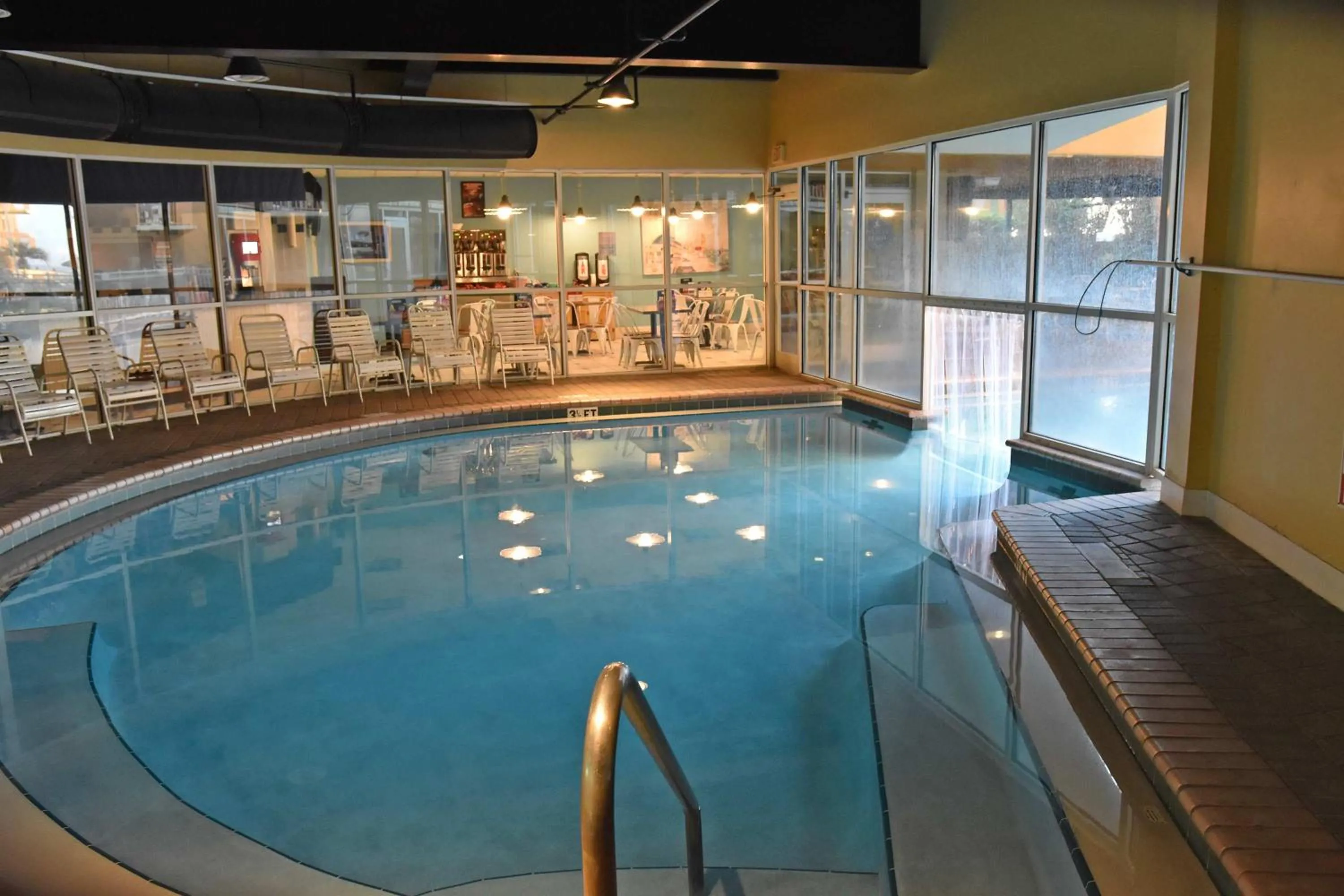 Swimming pool in Pelican Beach 1504 by Pelican Beach Management