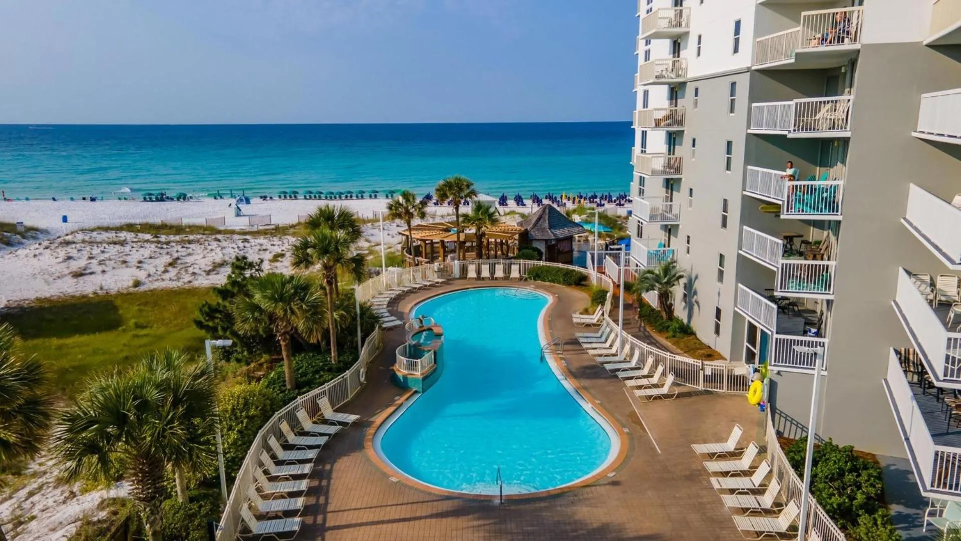 Swimming pool in Pelican Beach 1504 by Pelican Beach Management