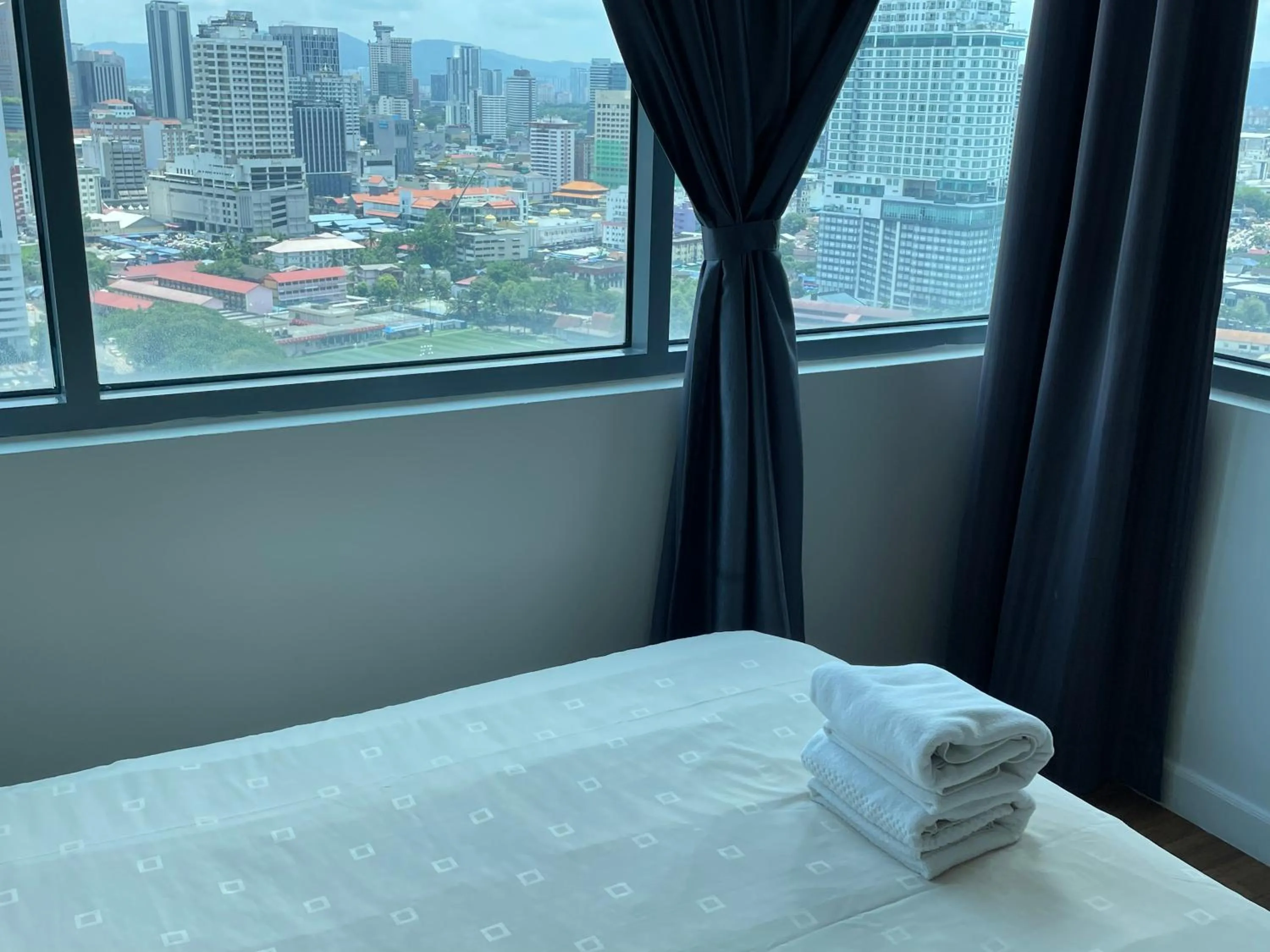 Bed in Mercu Summer Suite KLCC by Minshuku