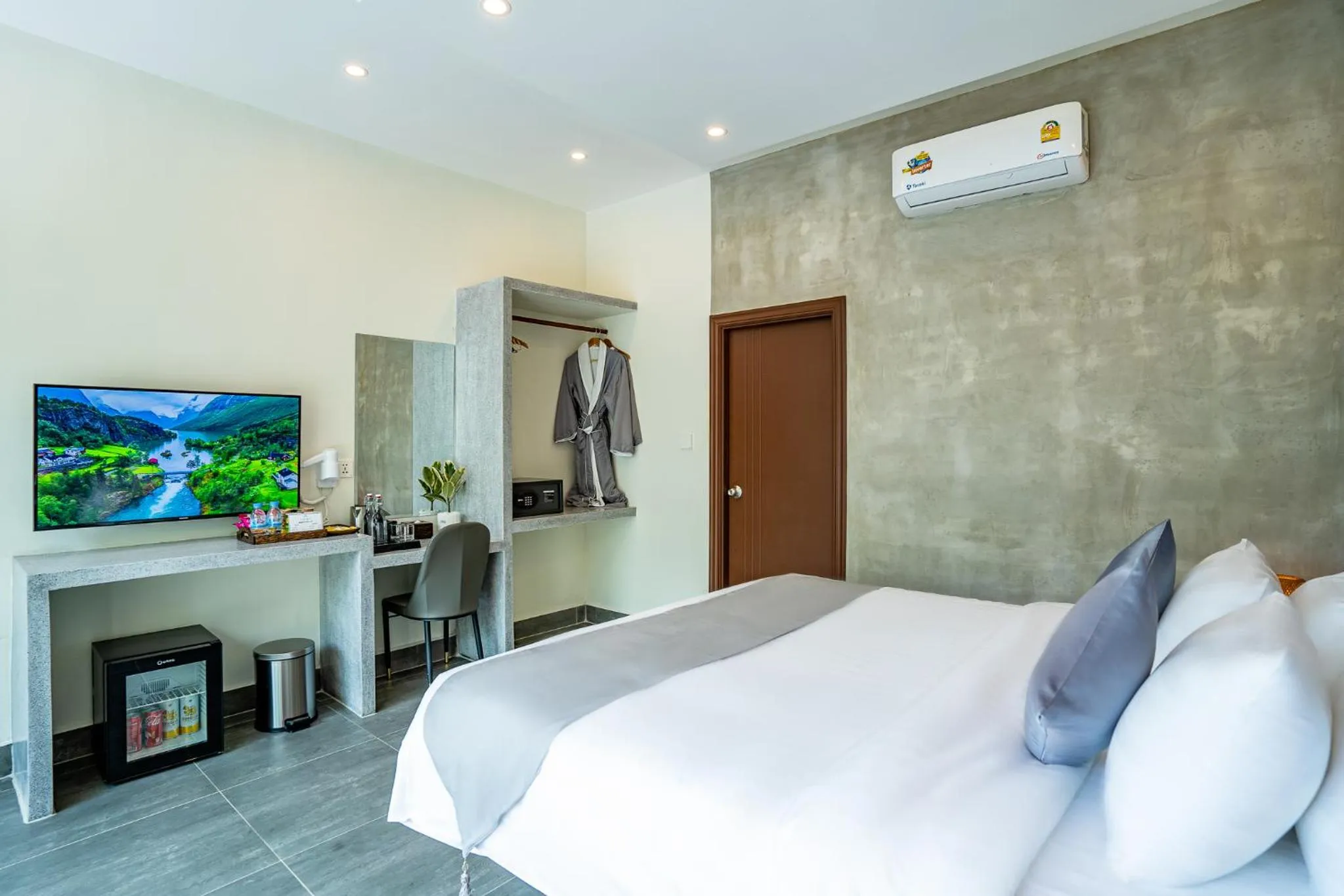 Photo of the whole room, Bed in Rainforest Hotel by NSUN