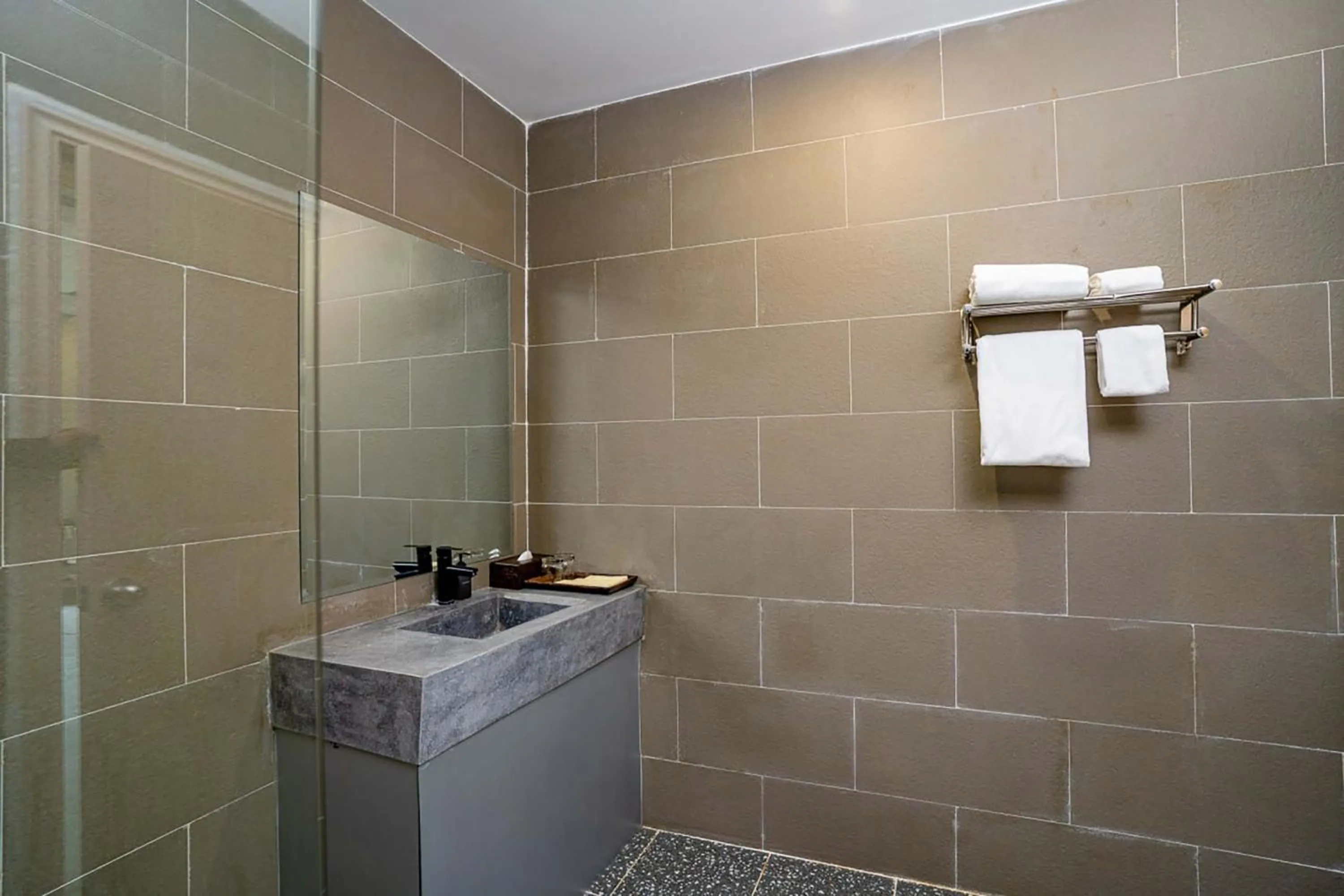 Bathroom in Rainforest Hotel by NSUN