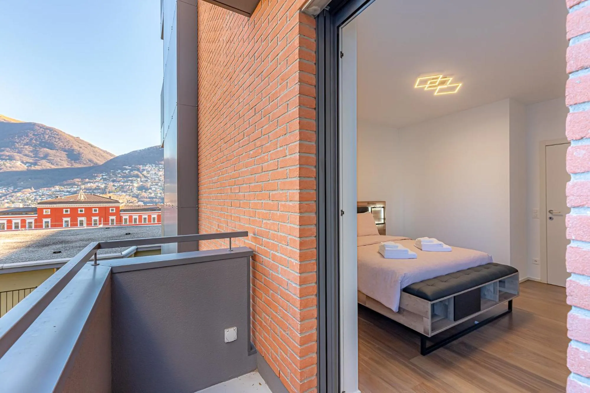 Balcony/Terrace, Bed in IMPERIAL of LUGANO 3 with a lake view behind the station and 10 min from the lake of Lugano