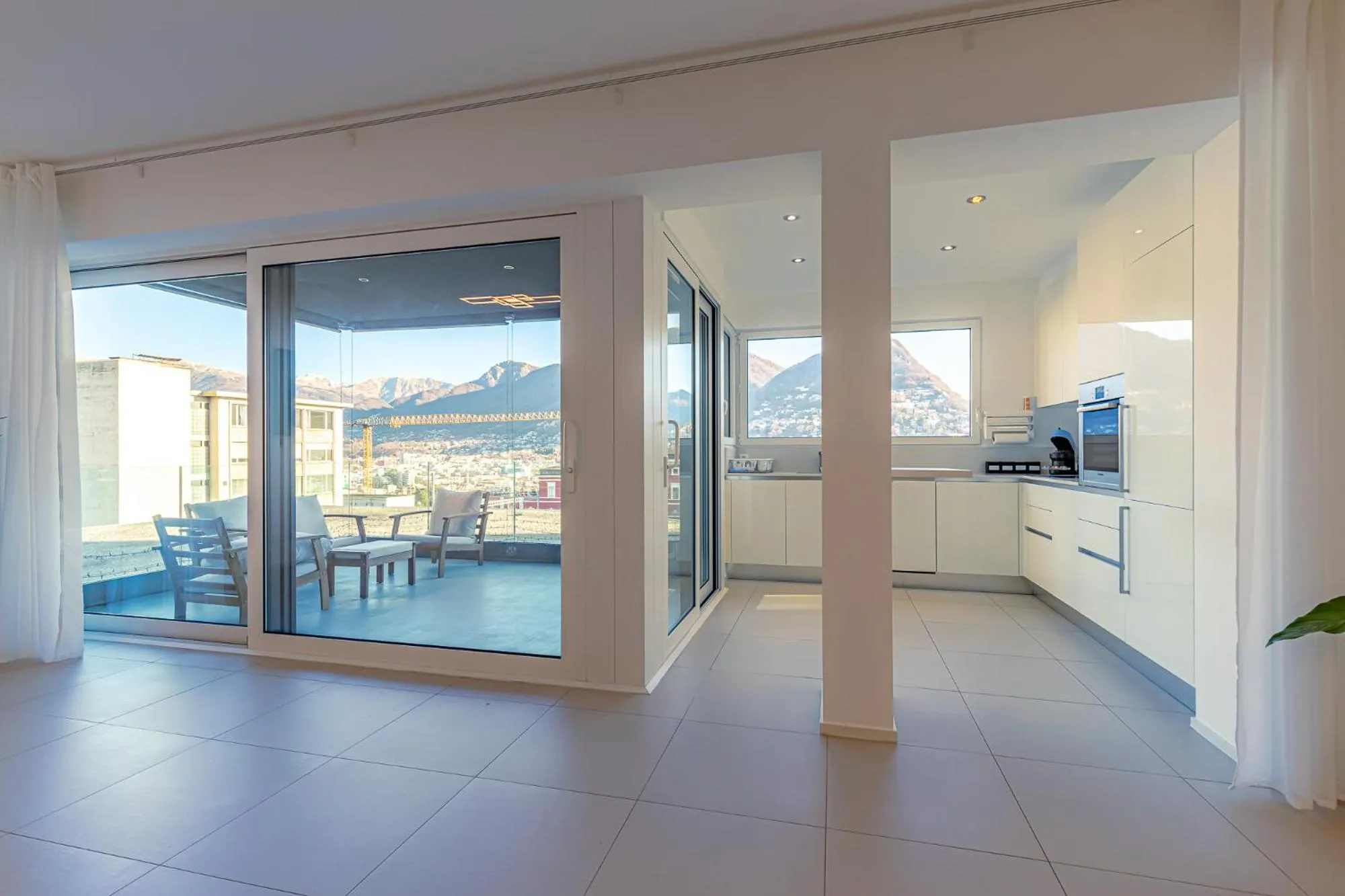 Balcony/Terrace in IMPERIAL of LUGANO 3 with a lake view behind the station and 10 min from the lake of Lugano