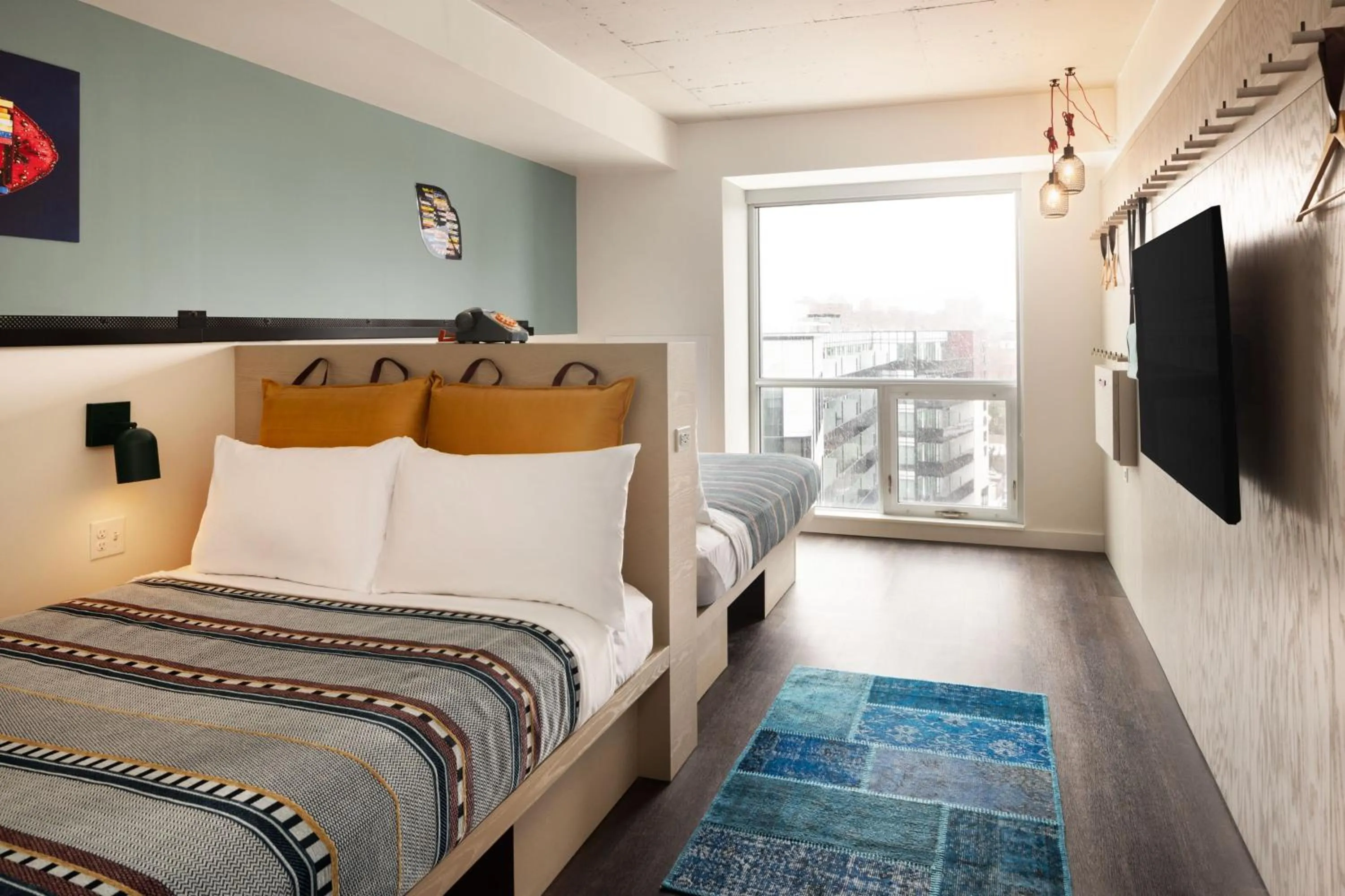 Photo of the whole room, Bed in Moxy Halifax Downtown