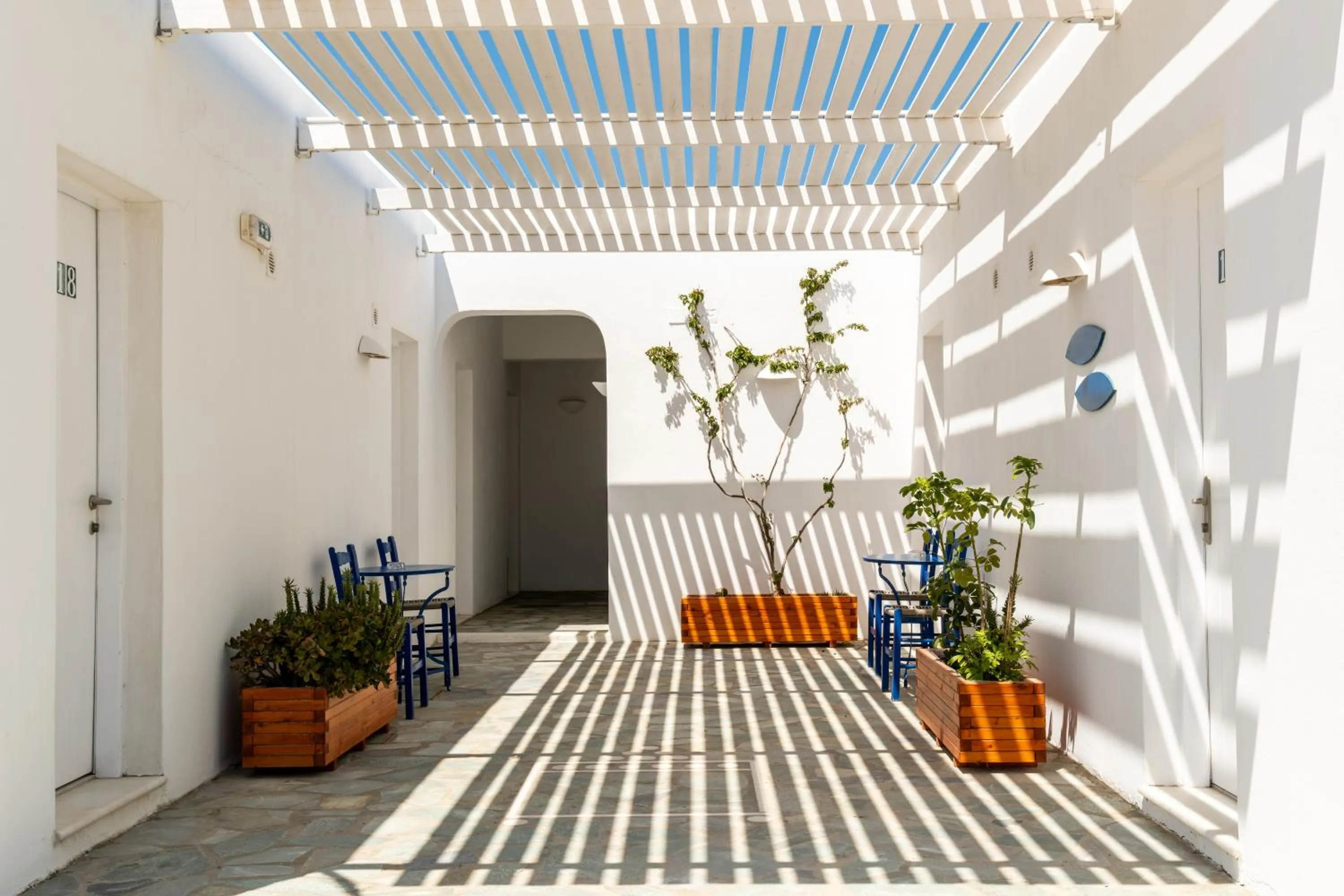 Property building in Naoussa Hotel Paros by Booking Kottas