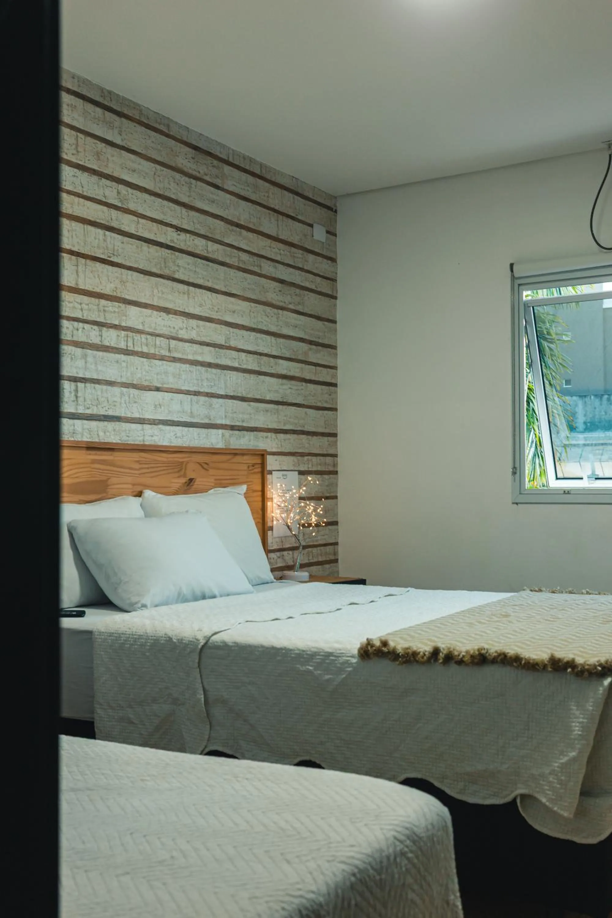 Bed in 55 Smart Hotel