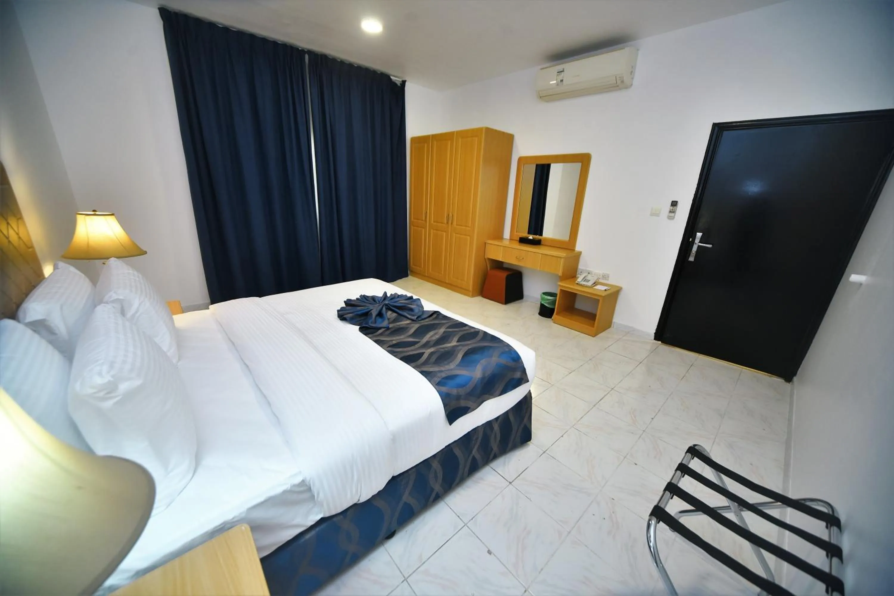 Bed in Alain Hotel Apartments Ajman