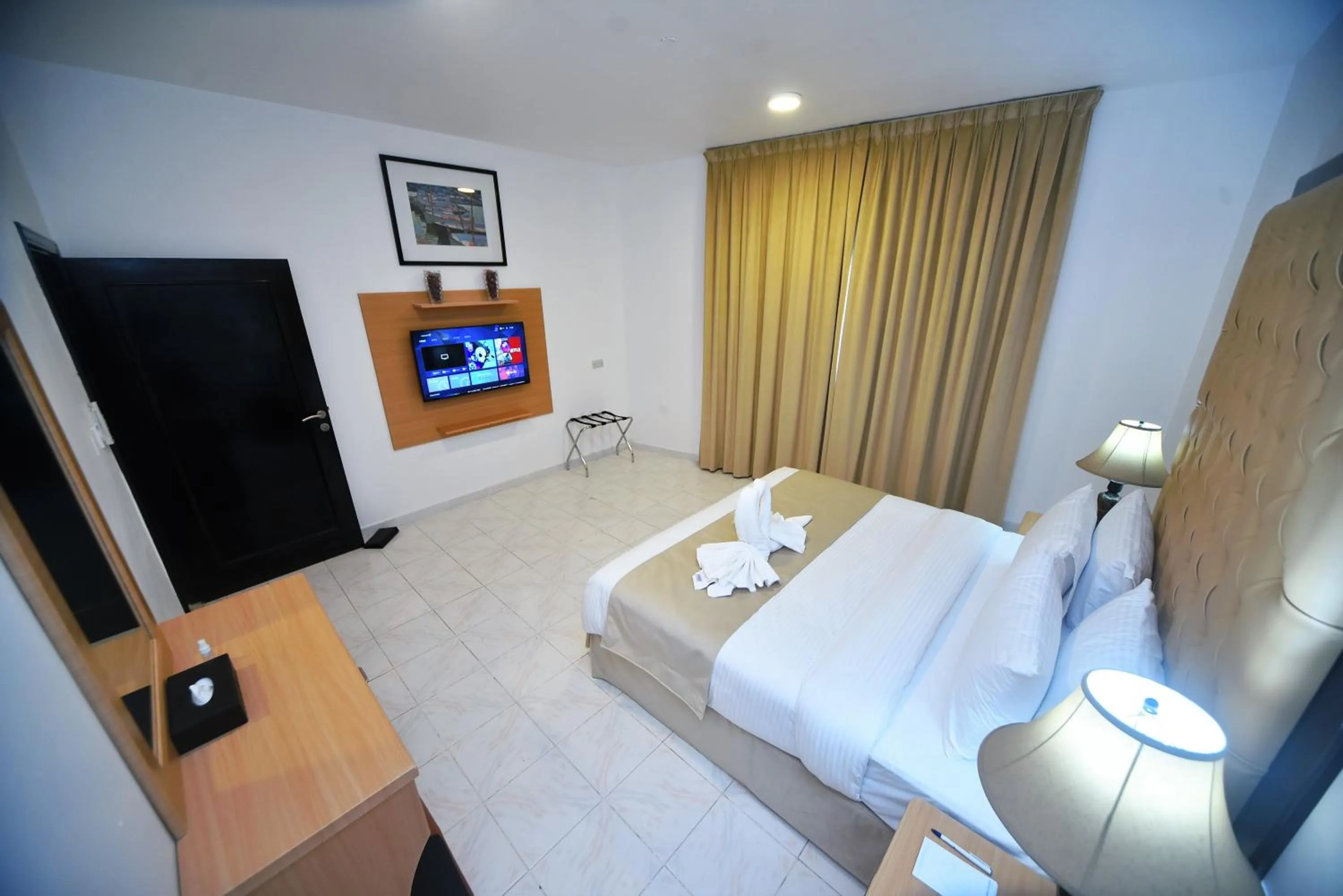 Bed in Alain Hotel Apartments Ajman