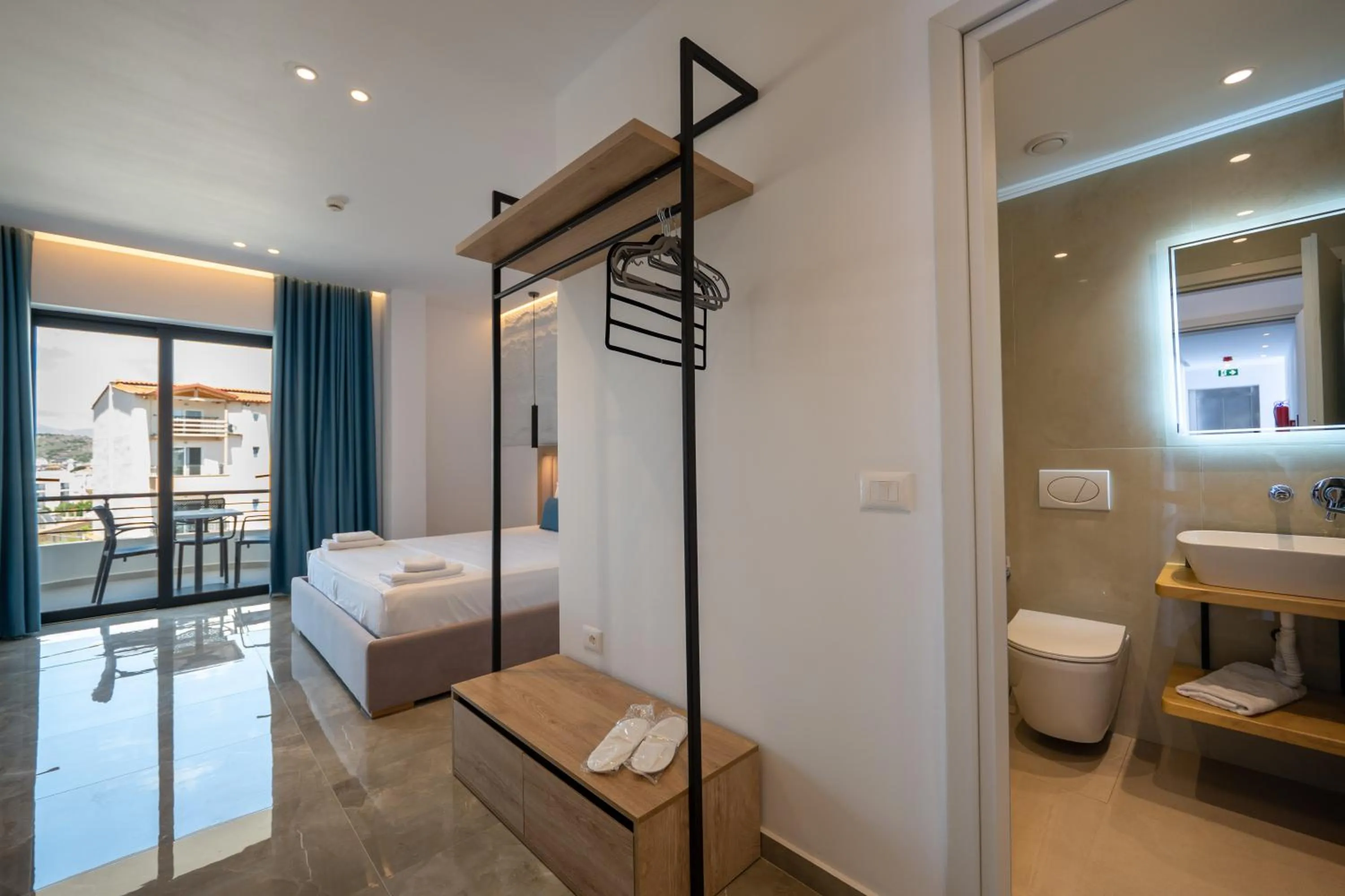 Toilet, Bed in Monel Hotel