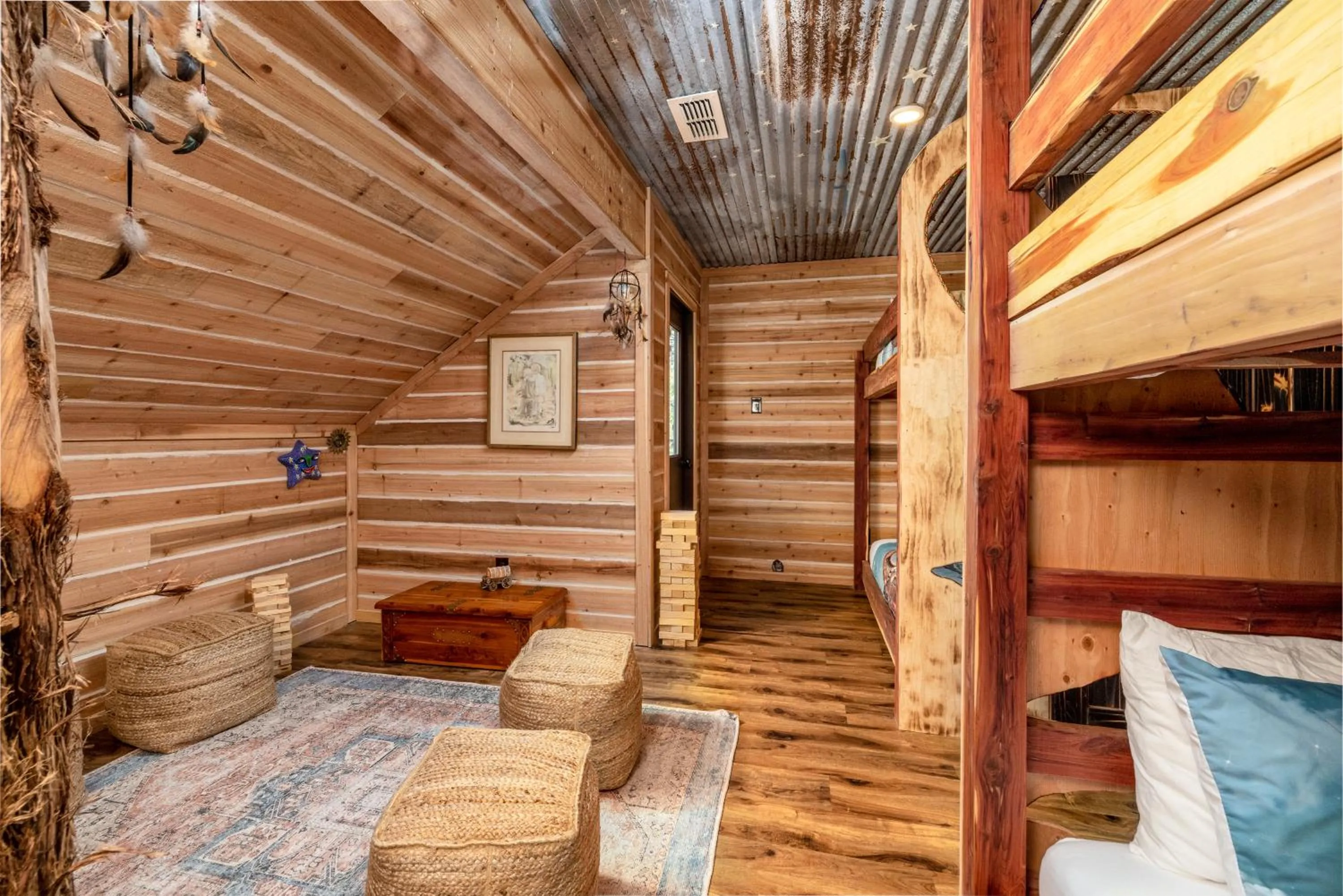 Seating area in "Magical Treehouse" w spiral slide off the deck 350 acres on the Brazos River! Tubing! Petting Zoo!