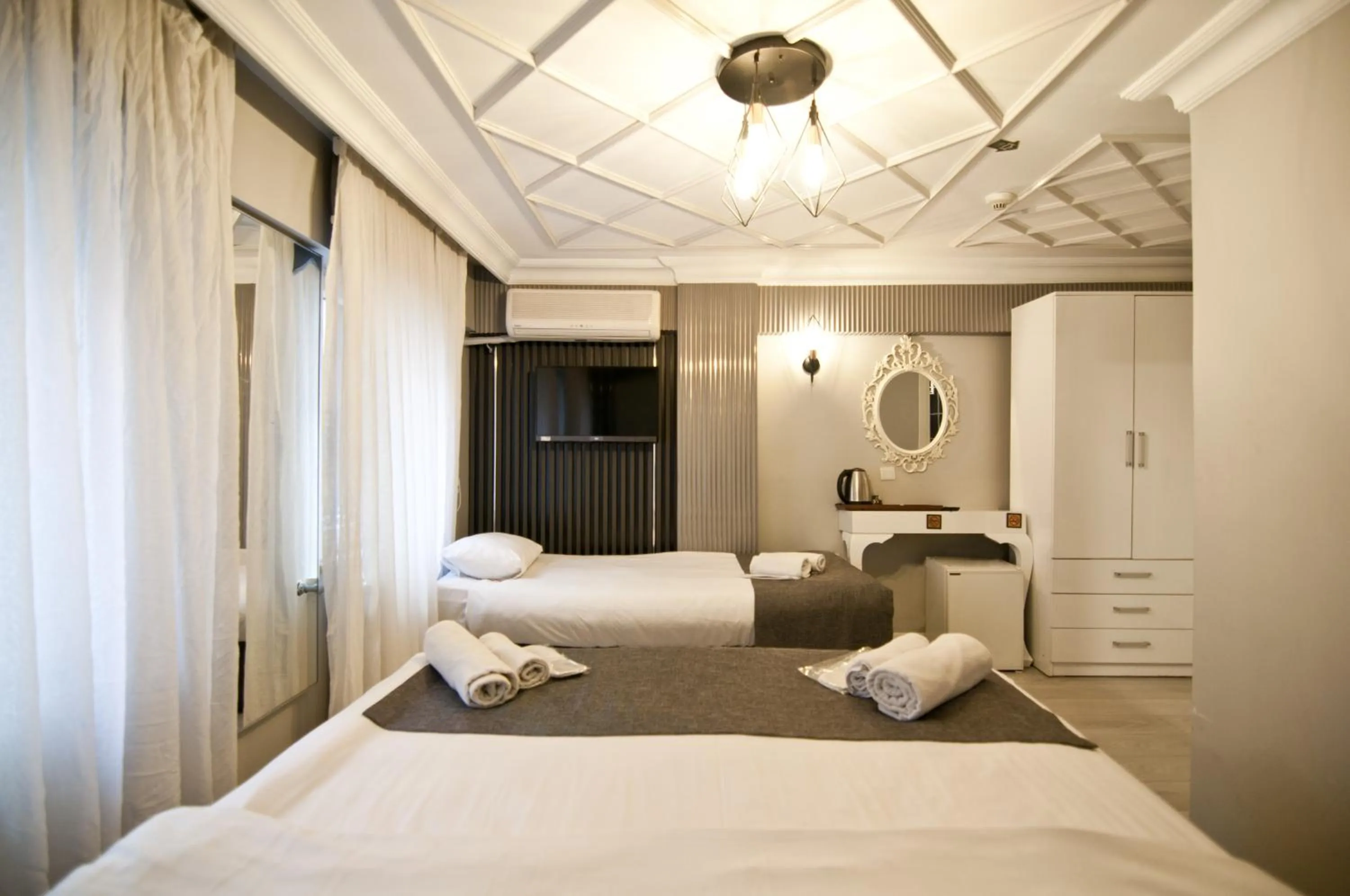 Bed in Nova City Hotel