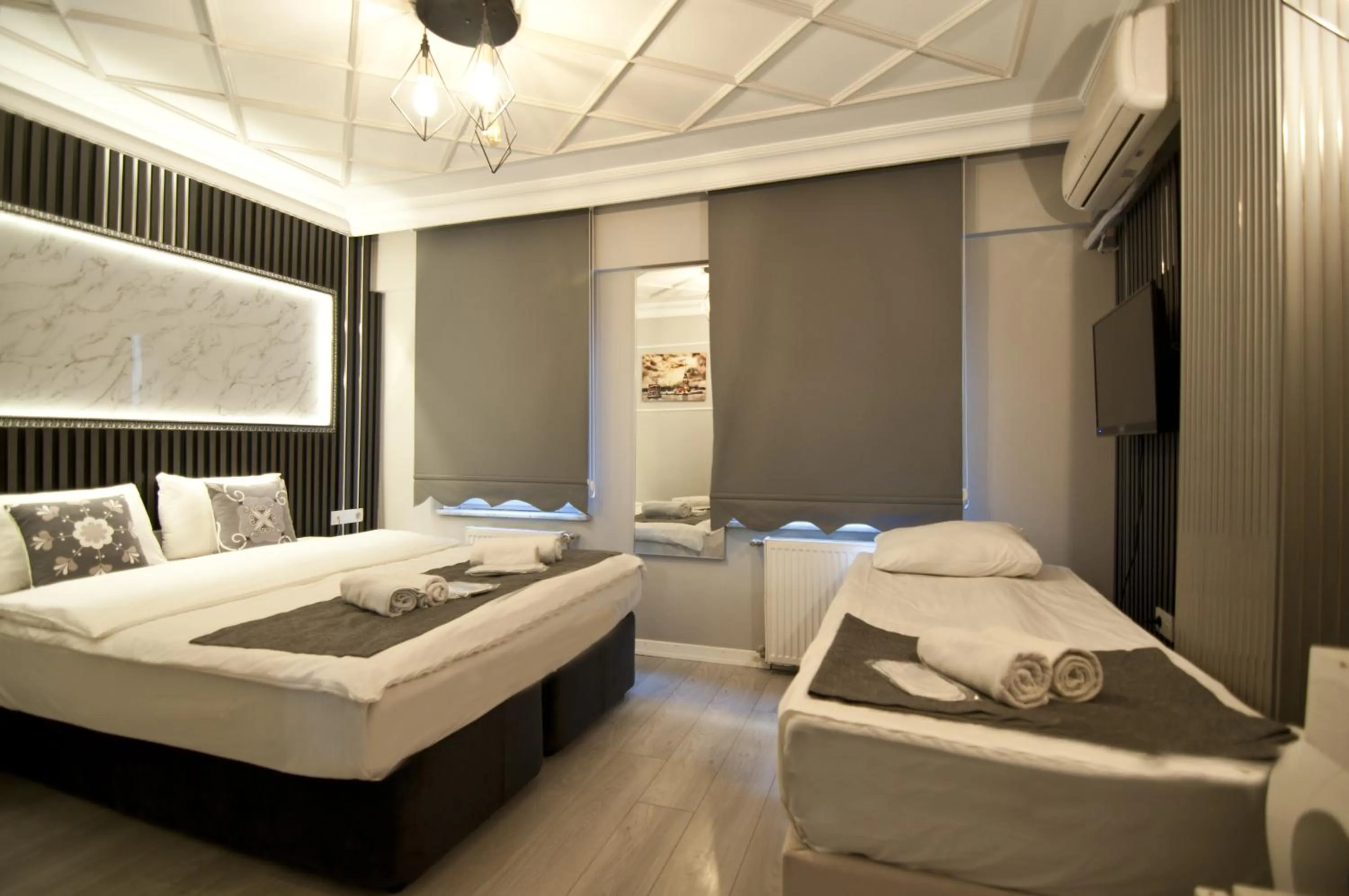 Bed in Nova City Hotel