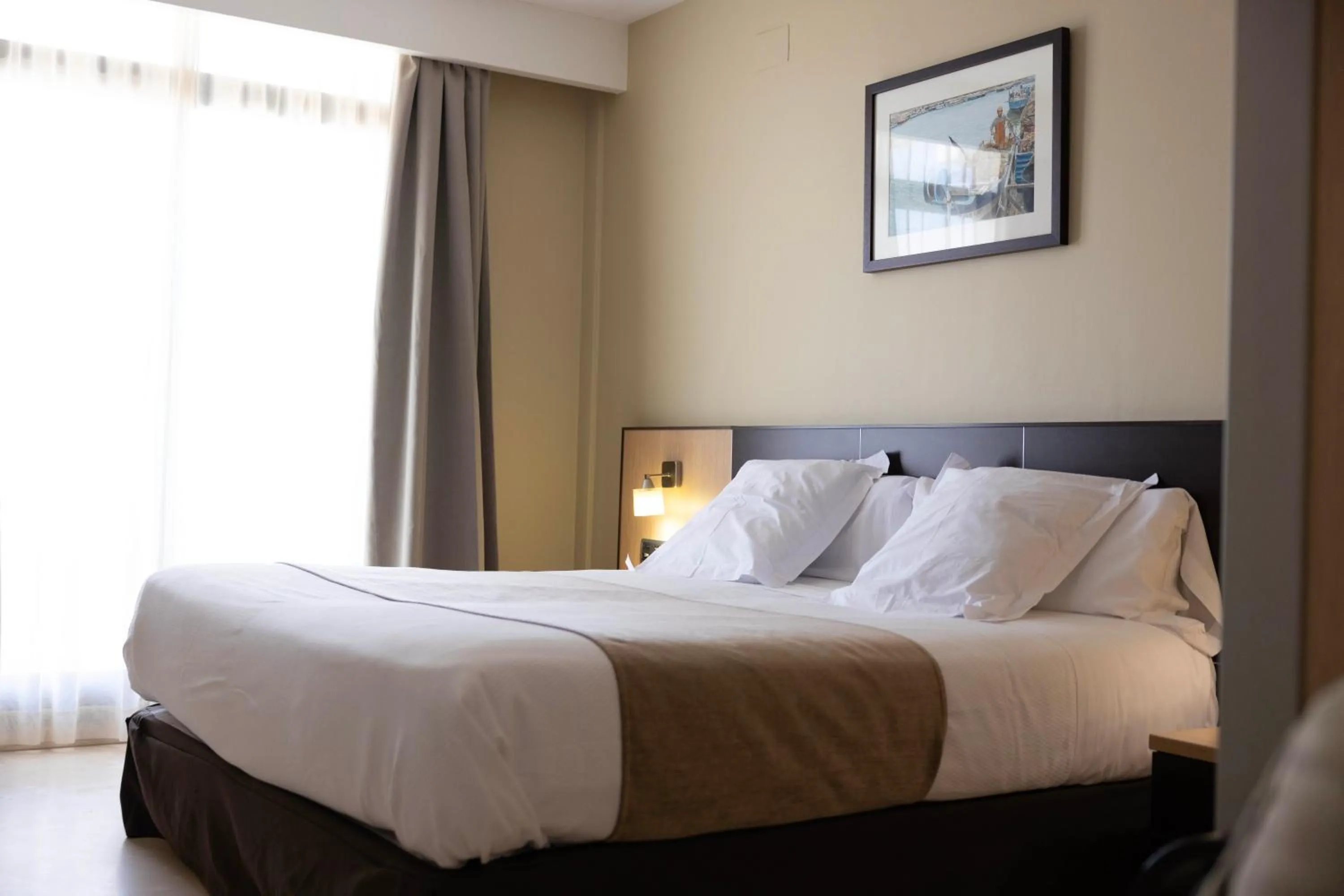 Bed in Hotel Flamingo