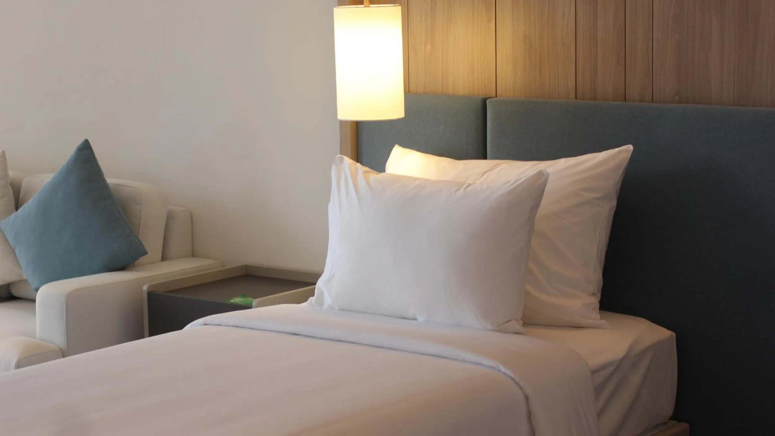 Bed in A La Carte Ha Long Bay Residence