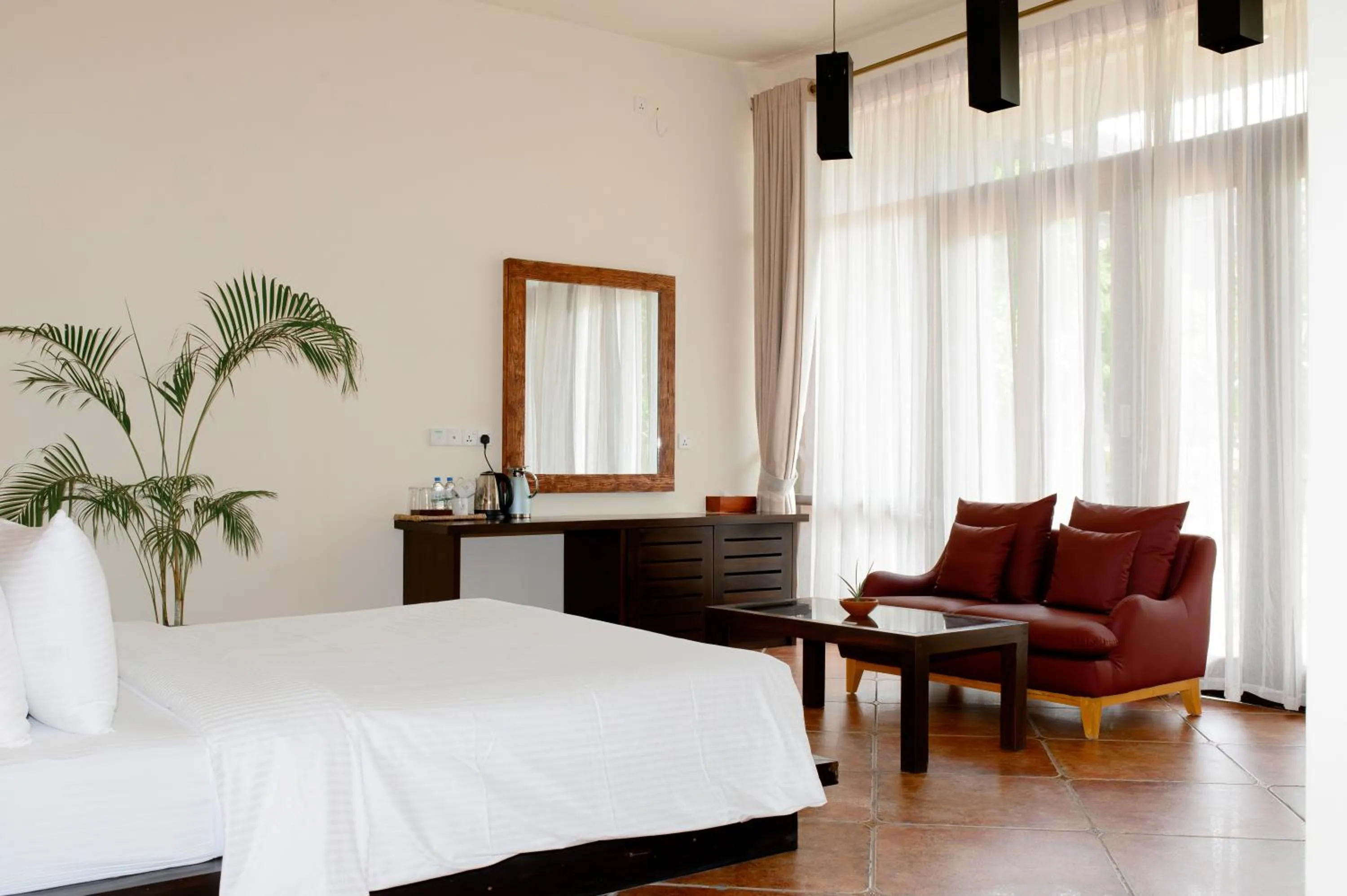 Living room, Bed in Celestia Ayurveda Resort