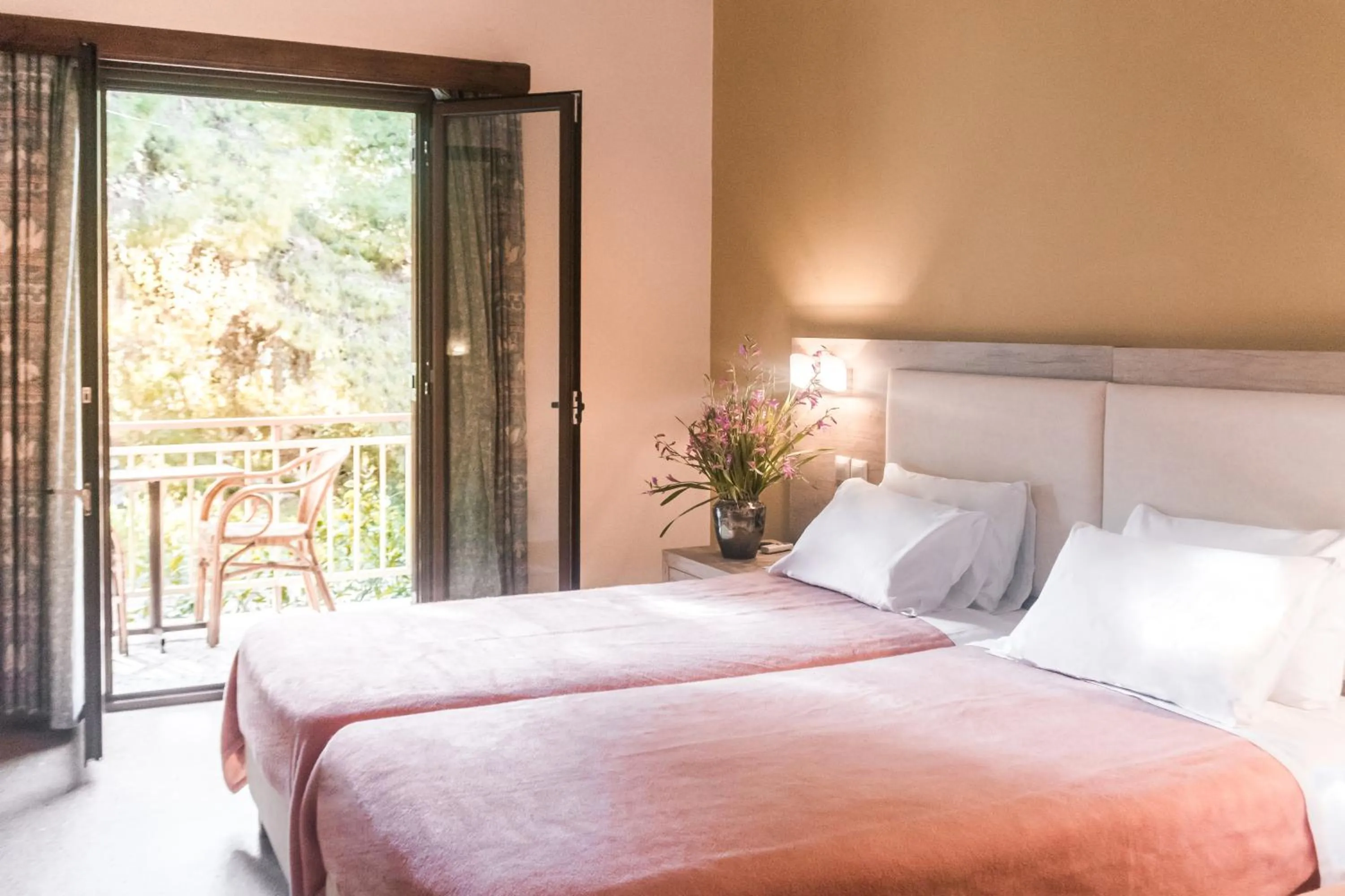 Bed in The Delfini Hotel