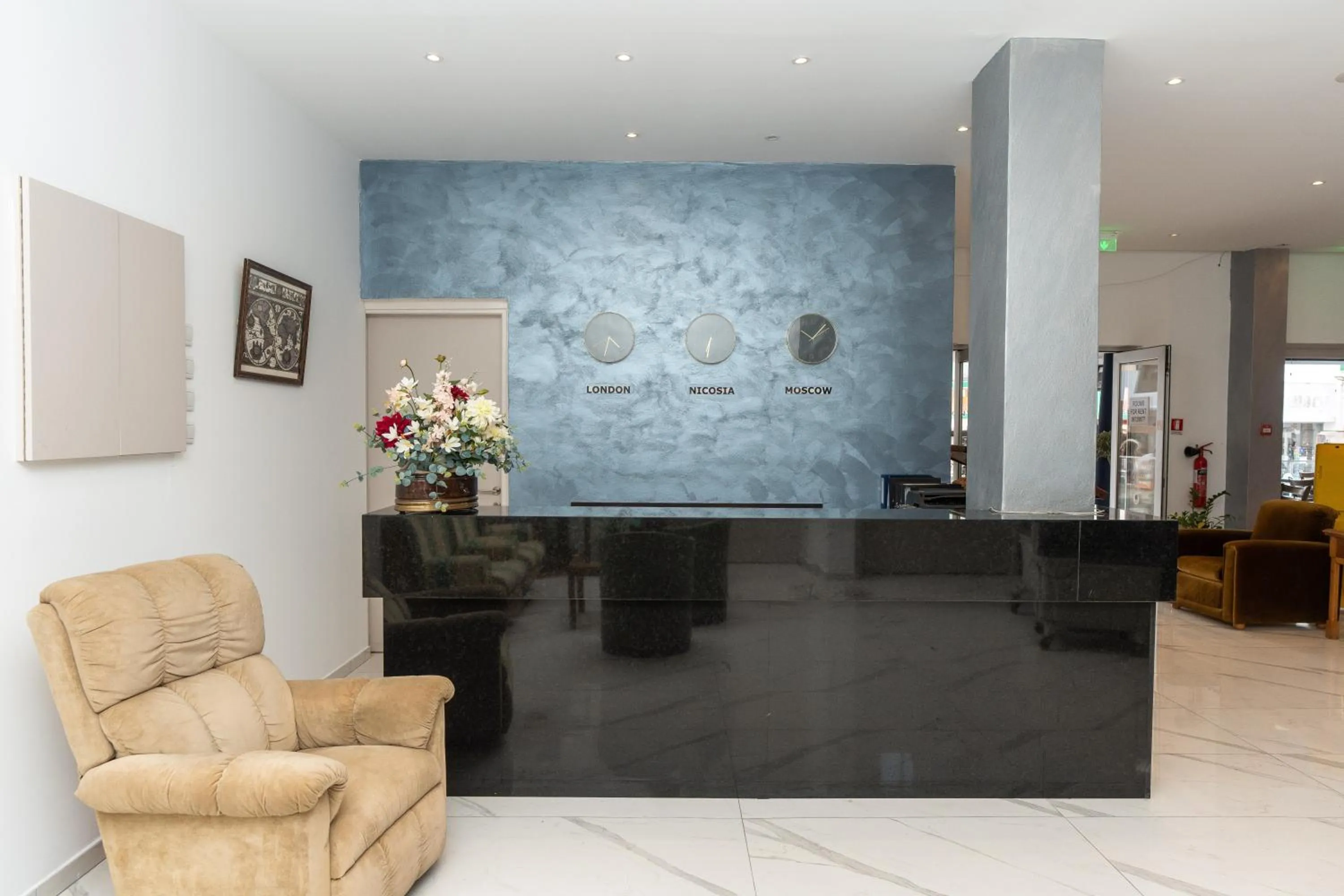 Lobby or reception in Flora Hotel Apartments