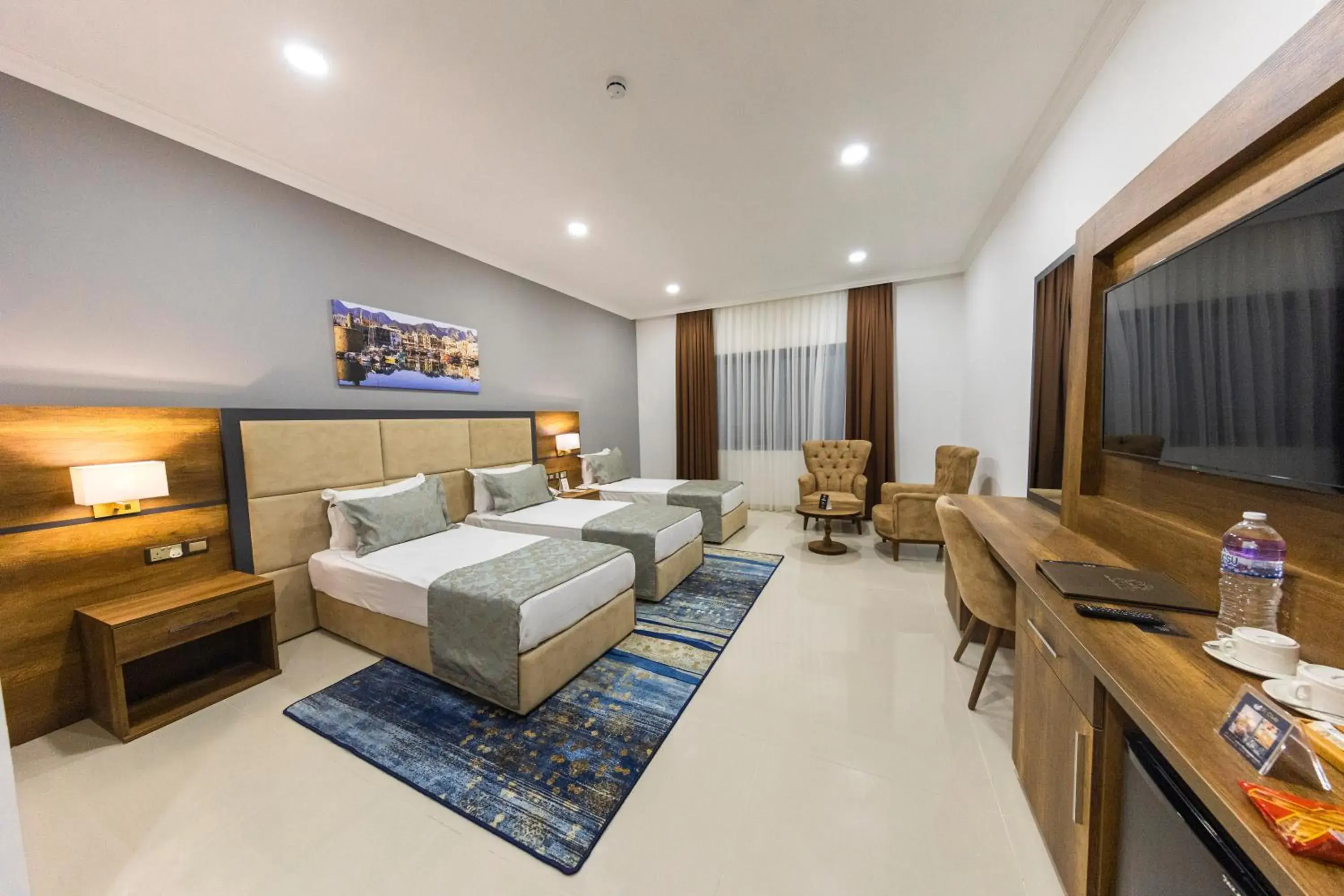 Economy Quadruple Room - single occupancy in Mc Palace Hotel Spa & Convention Economy Quadruple Room - single occupancy in Mc Palace Hotel Spa & Convention