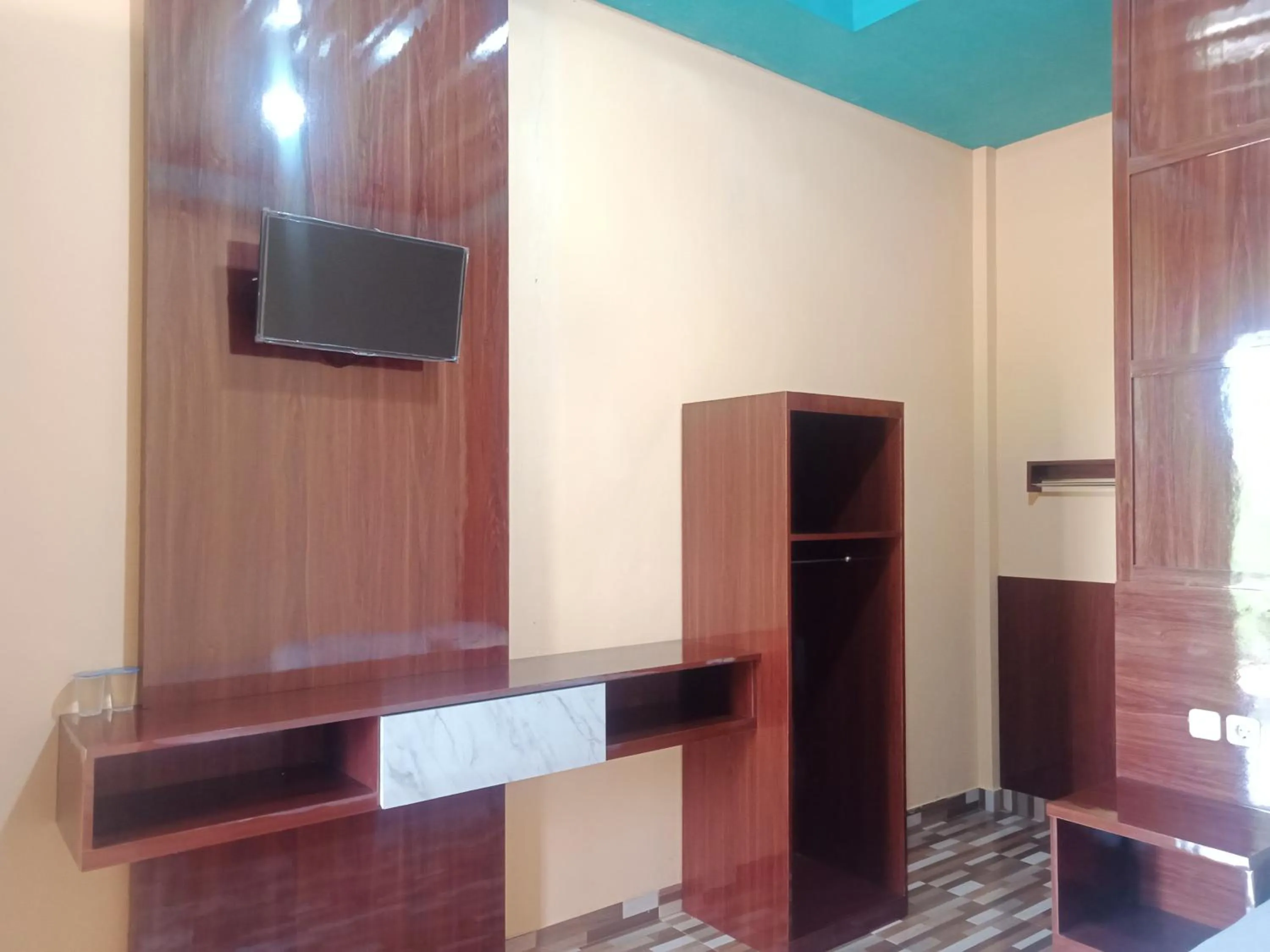 TV and multimedia in An Nur Homestay Bira Beach