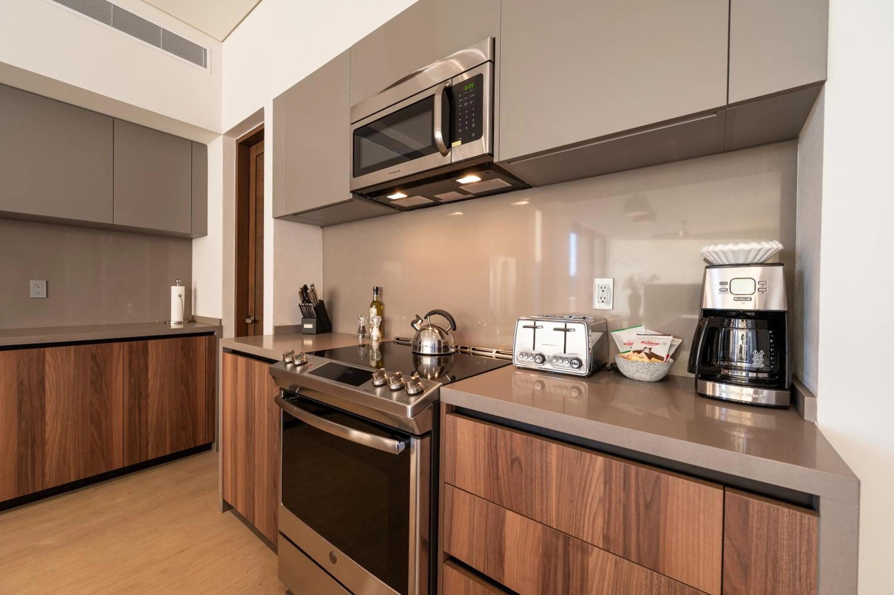 Kitchen or kitchenette in Paraiso Residences Marina Cabo by Capitalia