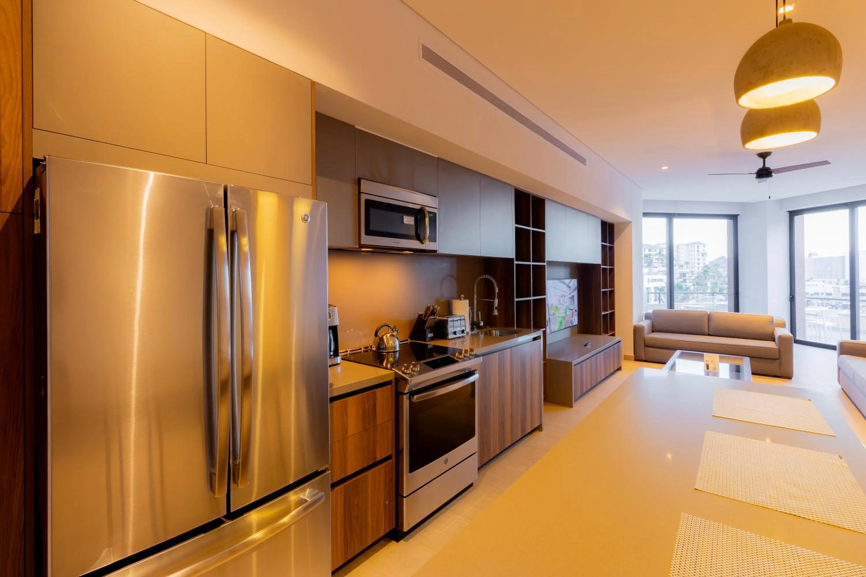 Kitchen or kitchenette in Paraiso Residences Marina Cabo by Capitalia