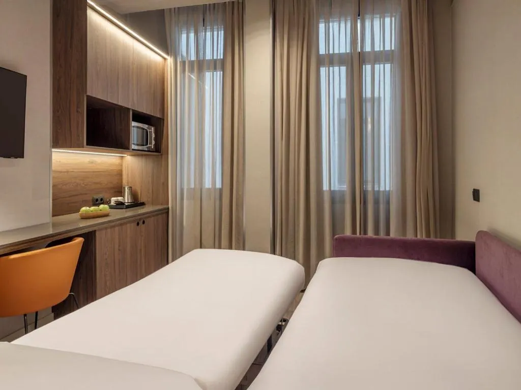 Bed in Regente Hotel