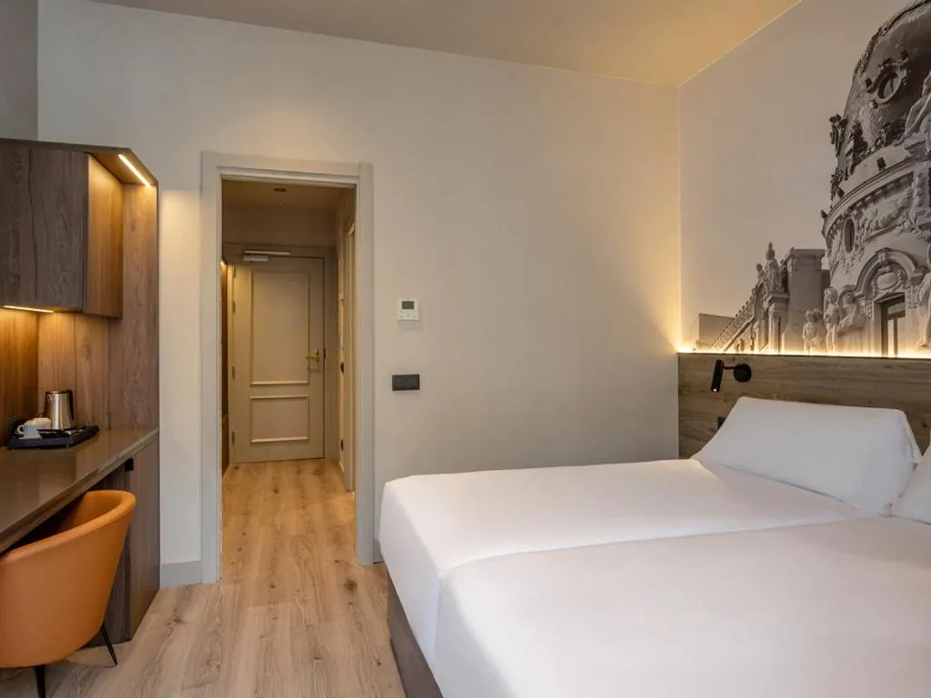 Bed in Regente Hotel