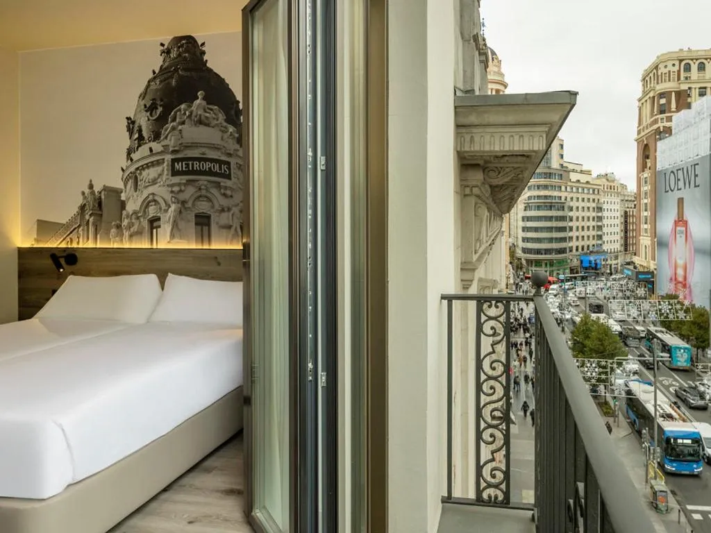 Balcony/Terrace, Bed in Regente Hotel