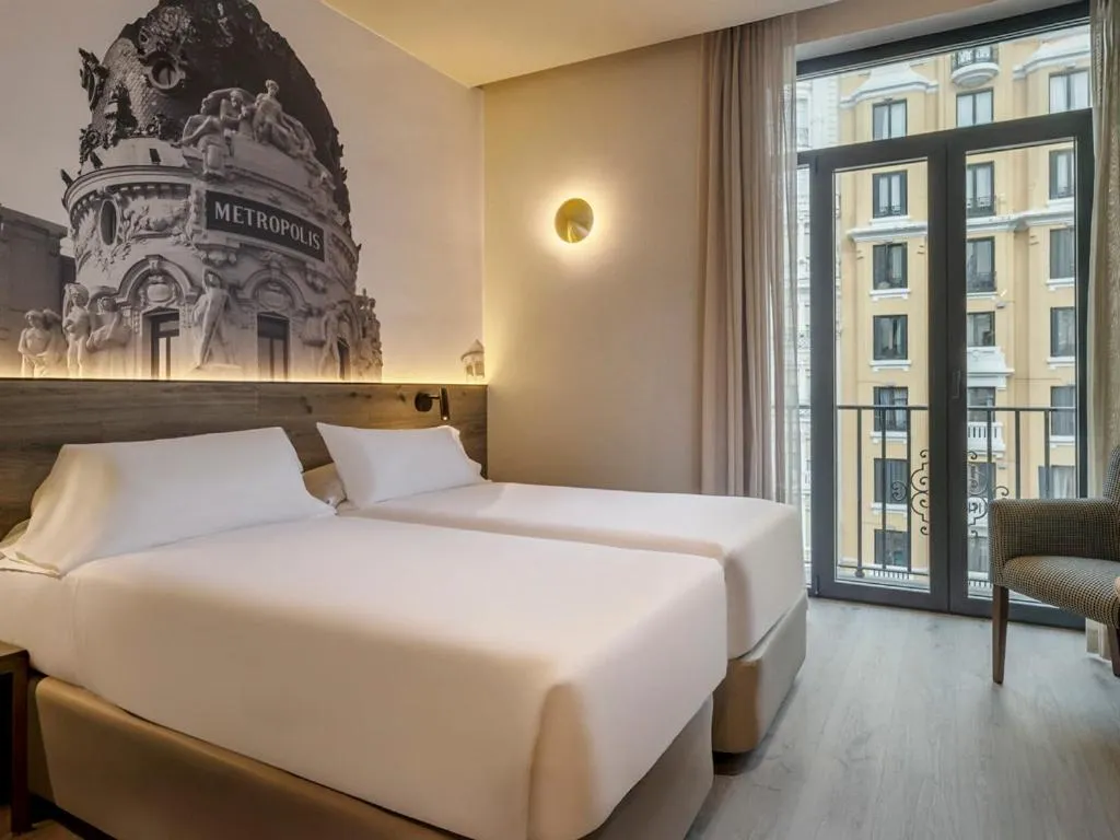 Bed in Regente Hotel