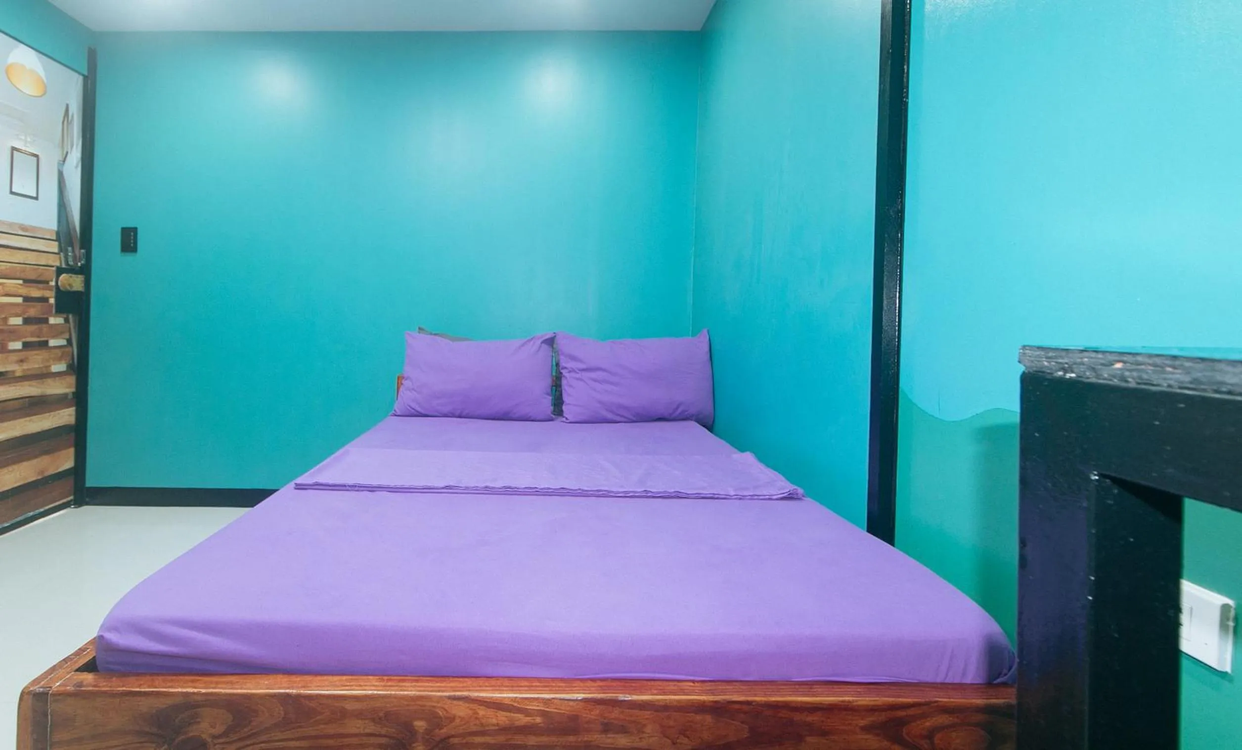 Photo of the whole room, Bed in RedDoorz @ Dolce Cabanas Beach Resort