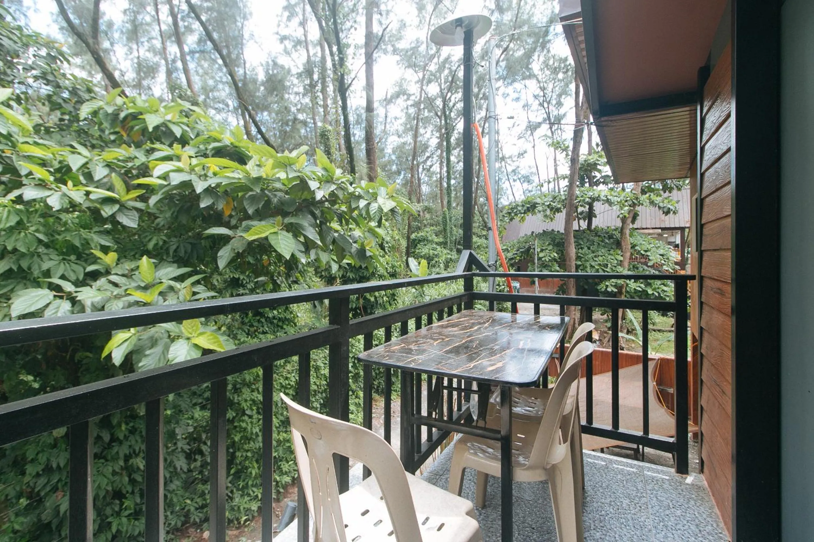 Balcony/Terrace in RedDoorz @ Dolce Cabanas Beach Resort