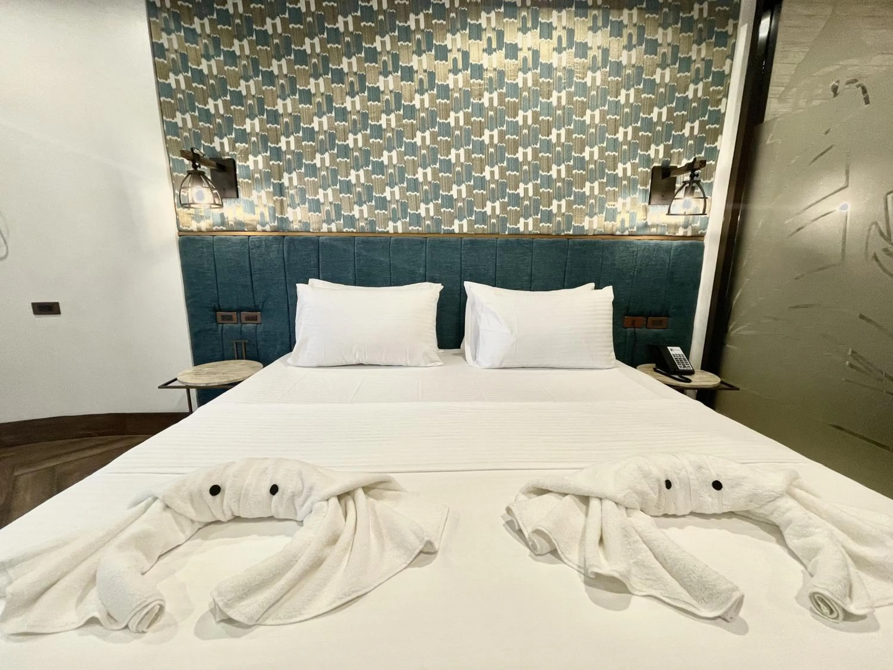 Bed in Lighthouse Point Hotel