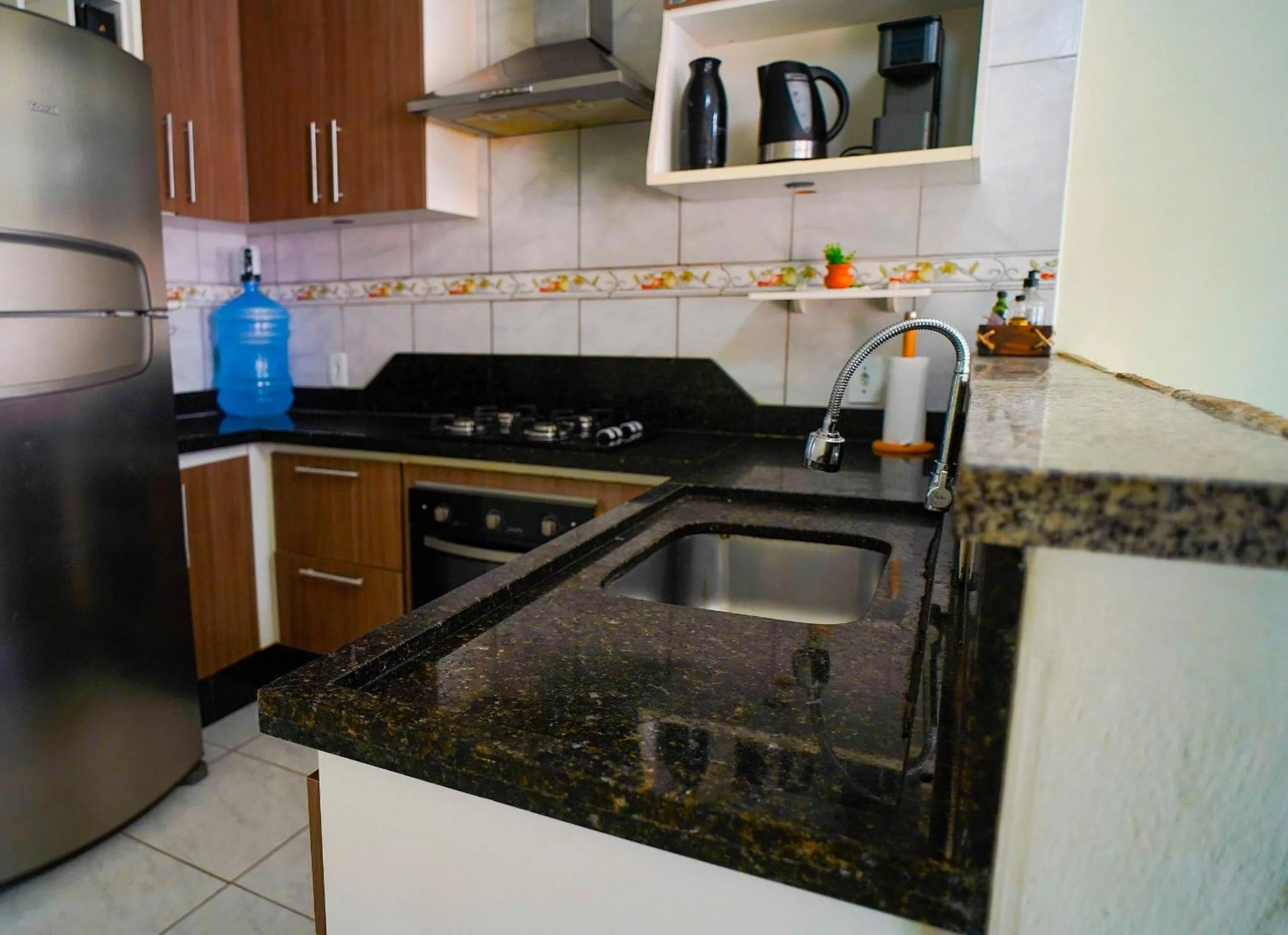 Kitchen or kitchenette in Ótima casa apenas 50metros da praia - em Balneário Piçarras