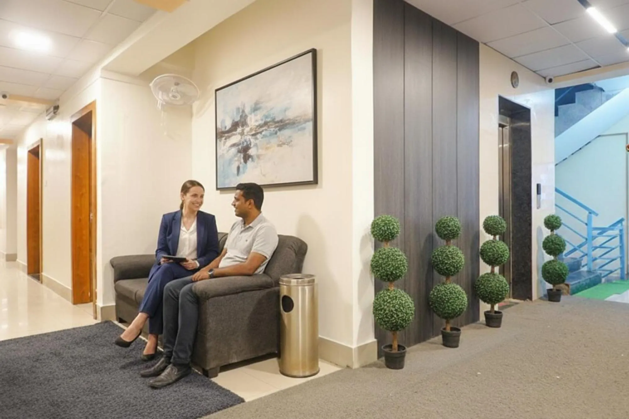 Seating area in FabHotel Embassy near Amanora Mall