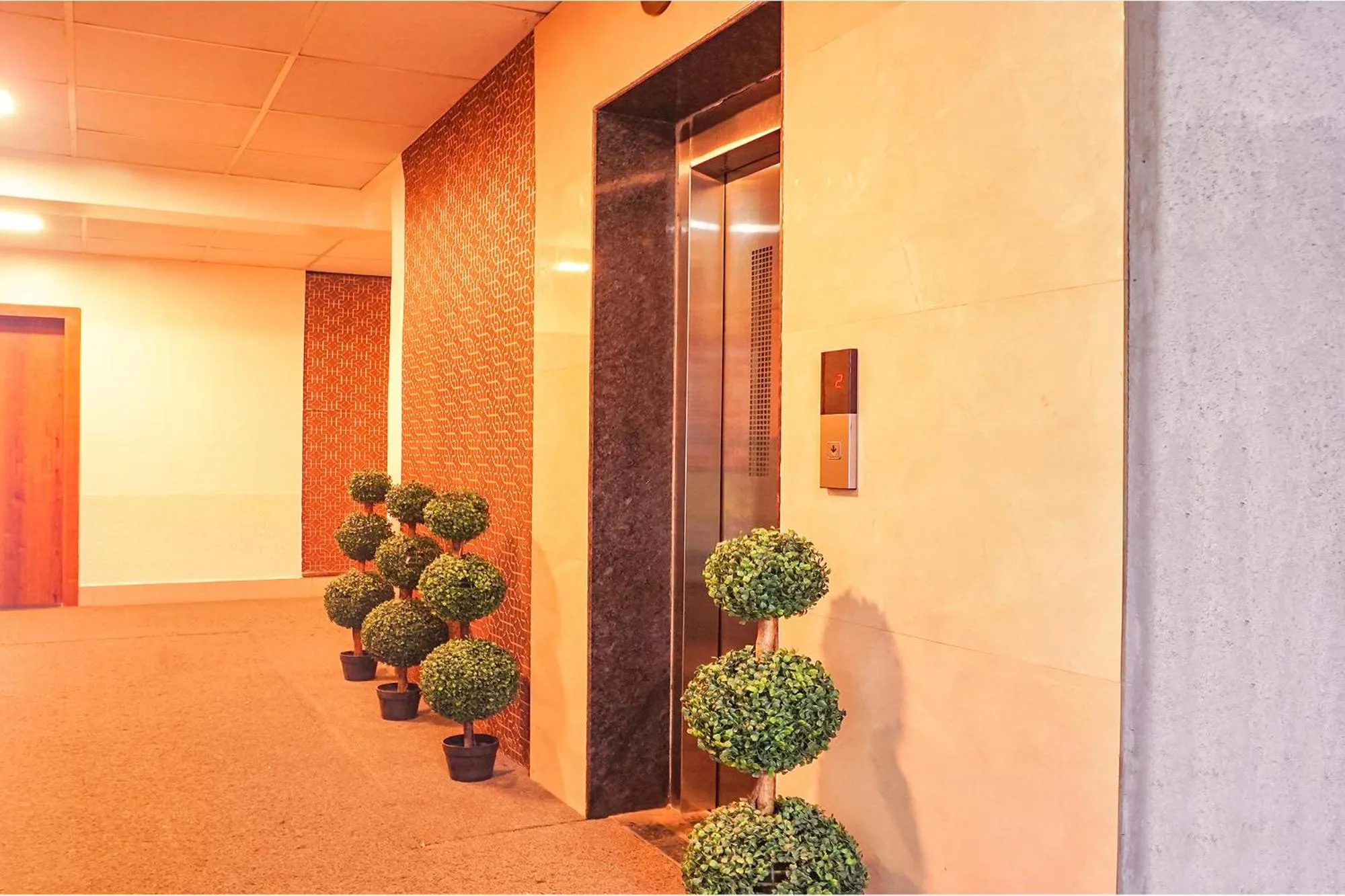 elevator in FabHotel Embassy near Amanora Mall