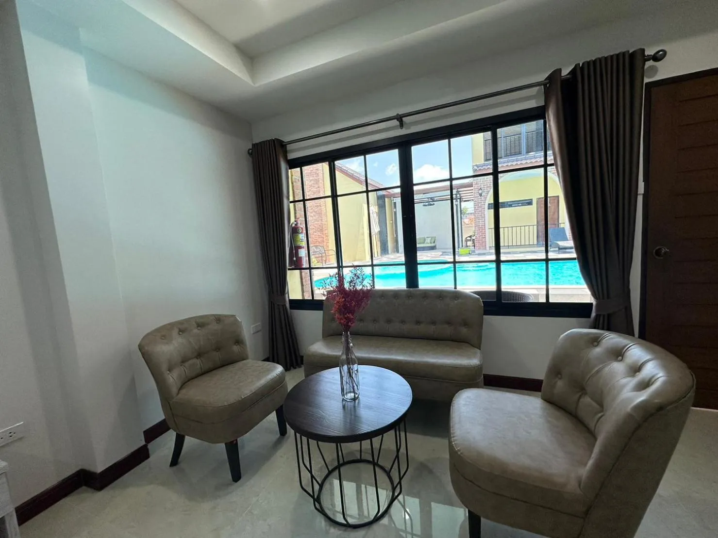 Seating area in CottagePine Rayong Resort&Cafe