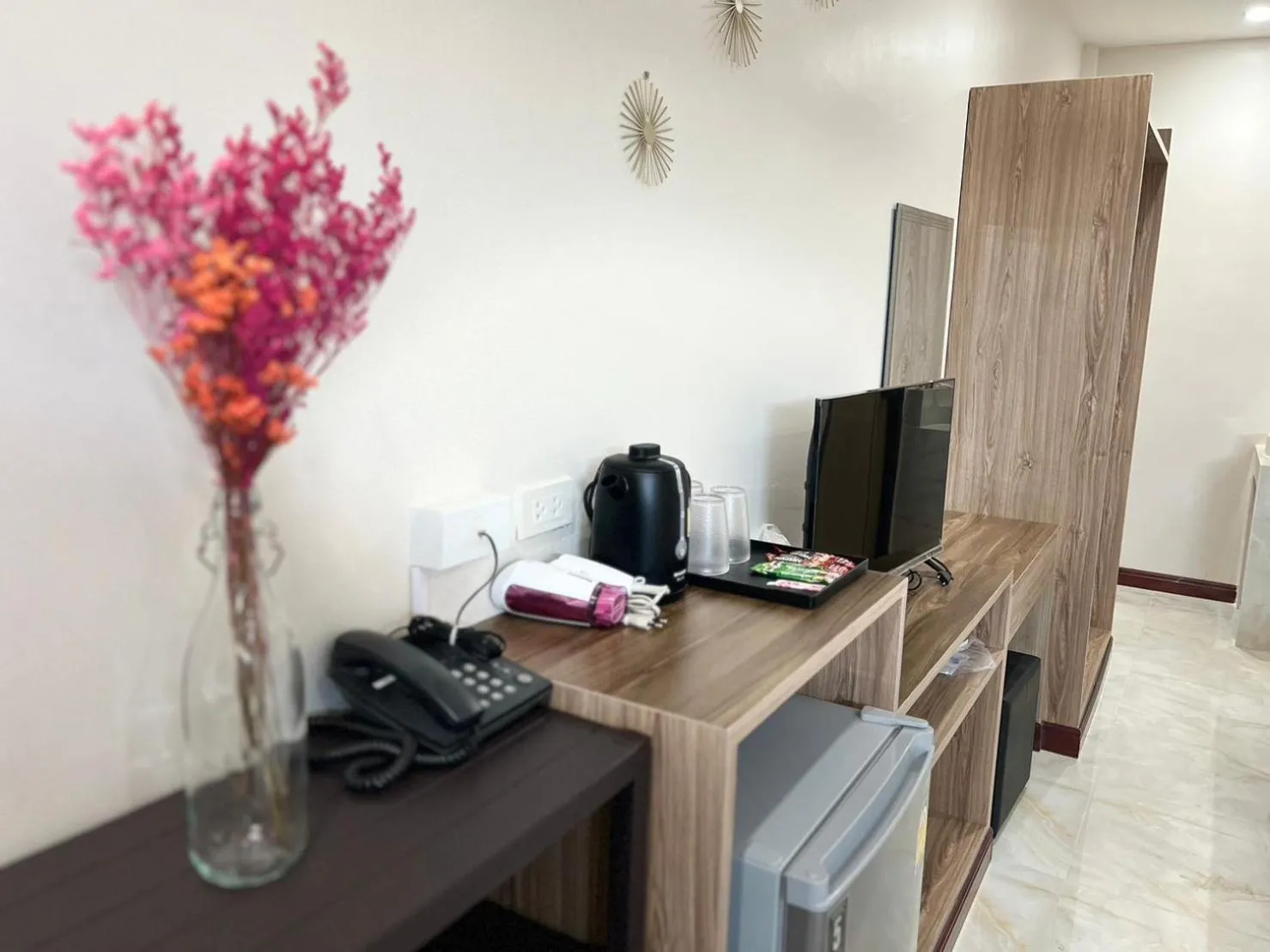 TV and multimedia in CottagePine Rayong Resort&Cafe