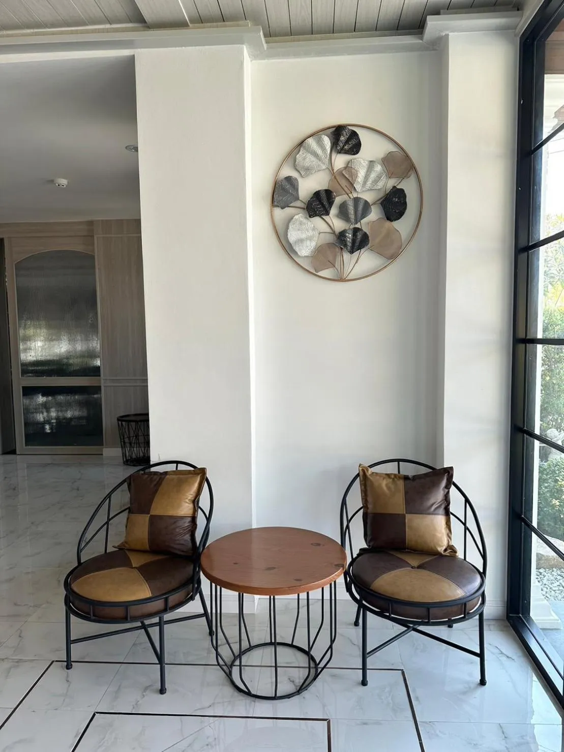 Seating area in CottagePine Rayong Resort&Cafe